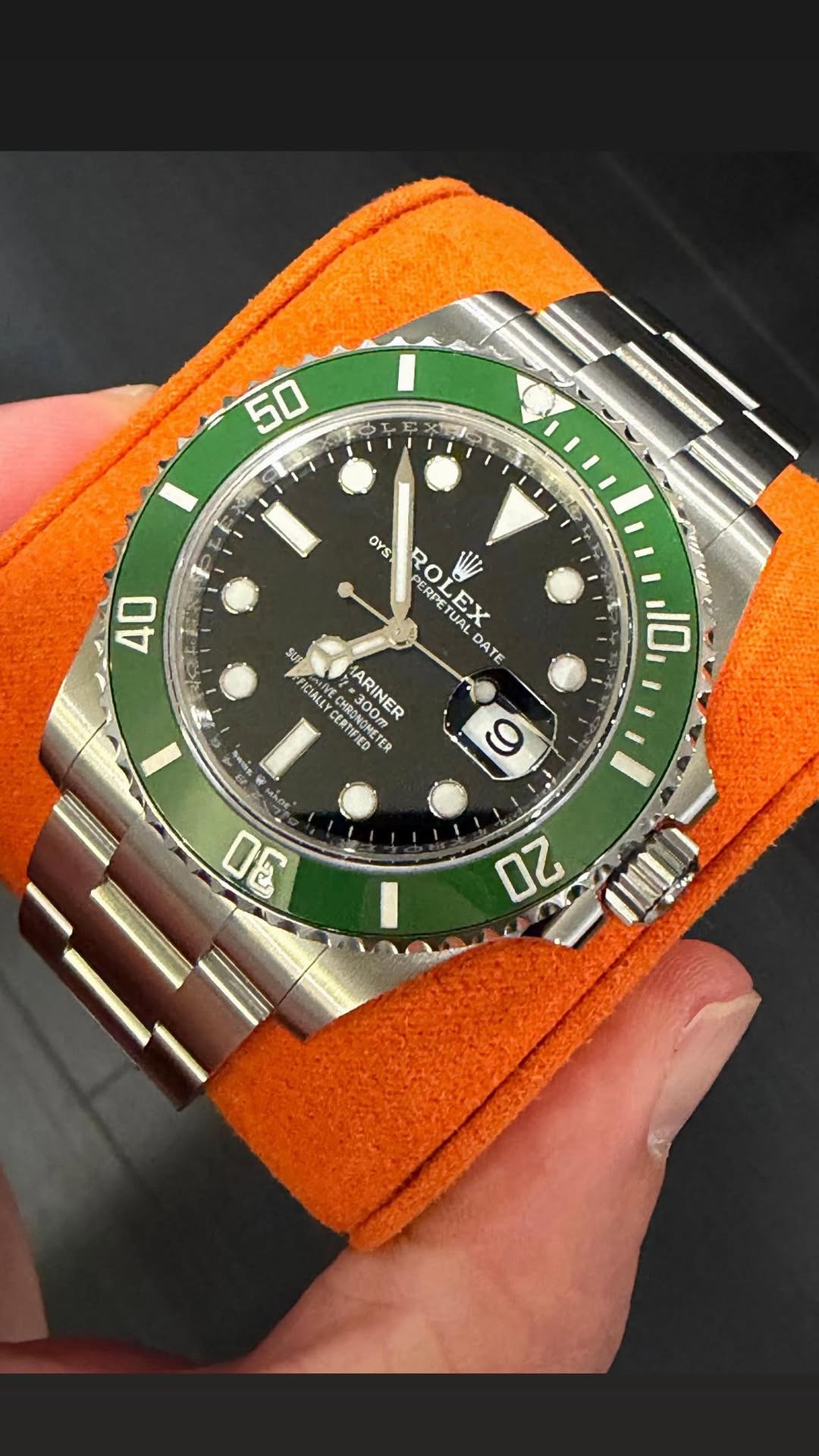 May be an image of wrist watch and text