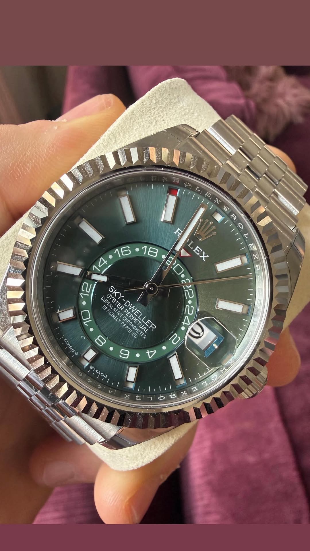 May be an image of wrist watch and text
