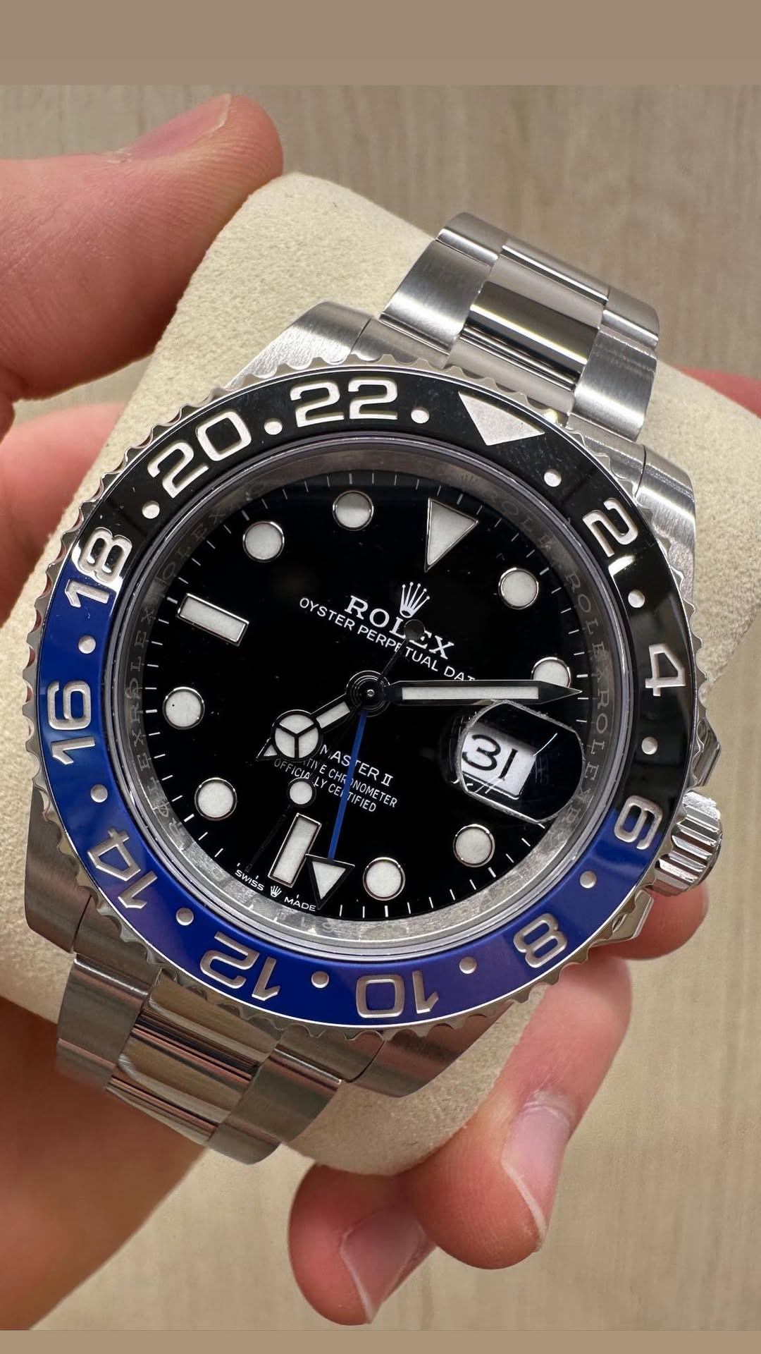 May be an image of wrist watch and text