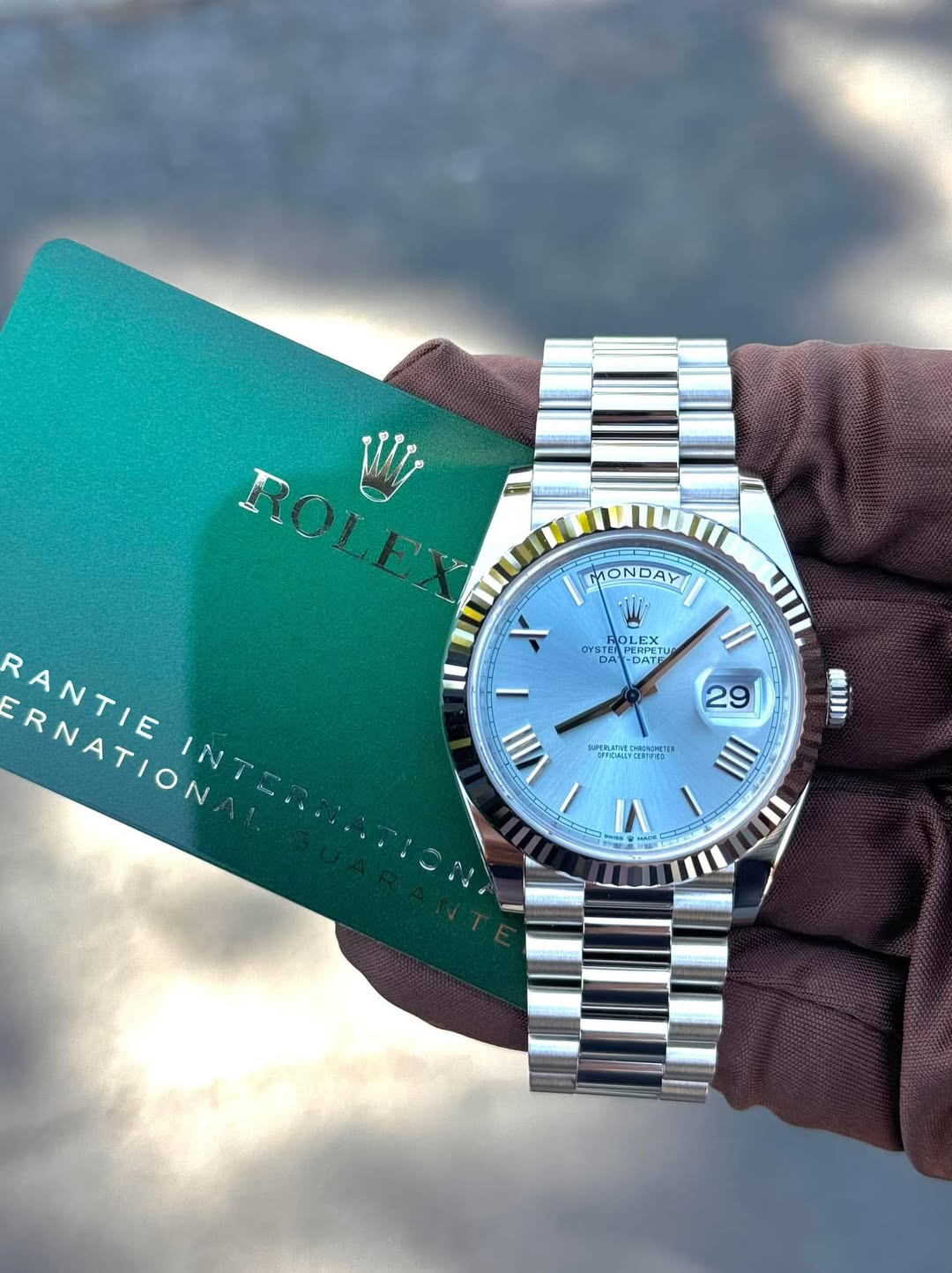 May be an image of wrist watch and text