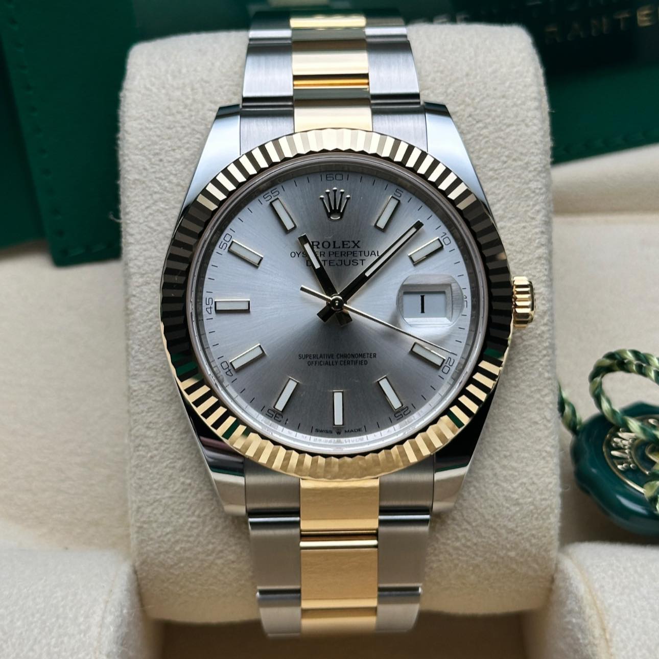 May be an image of wrist watch and text