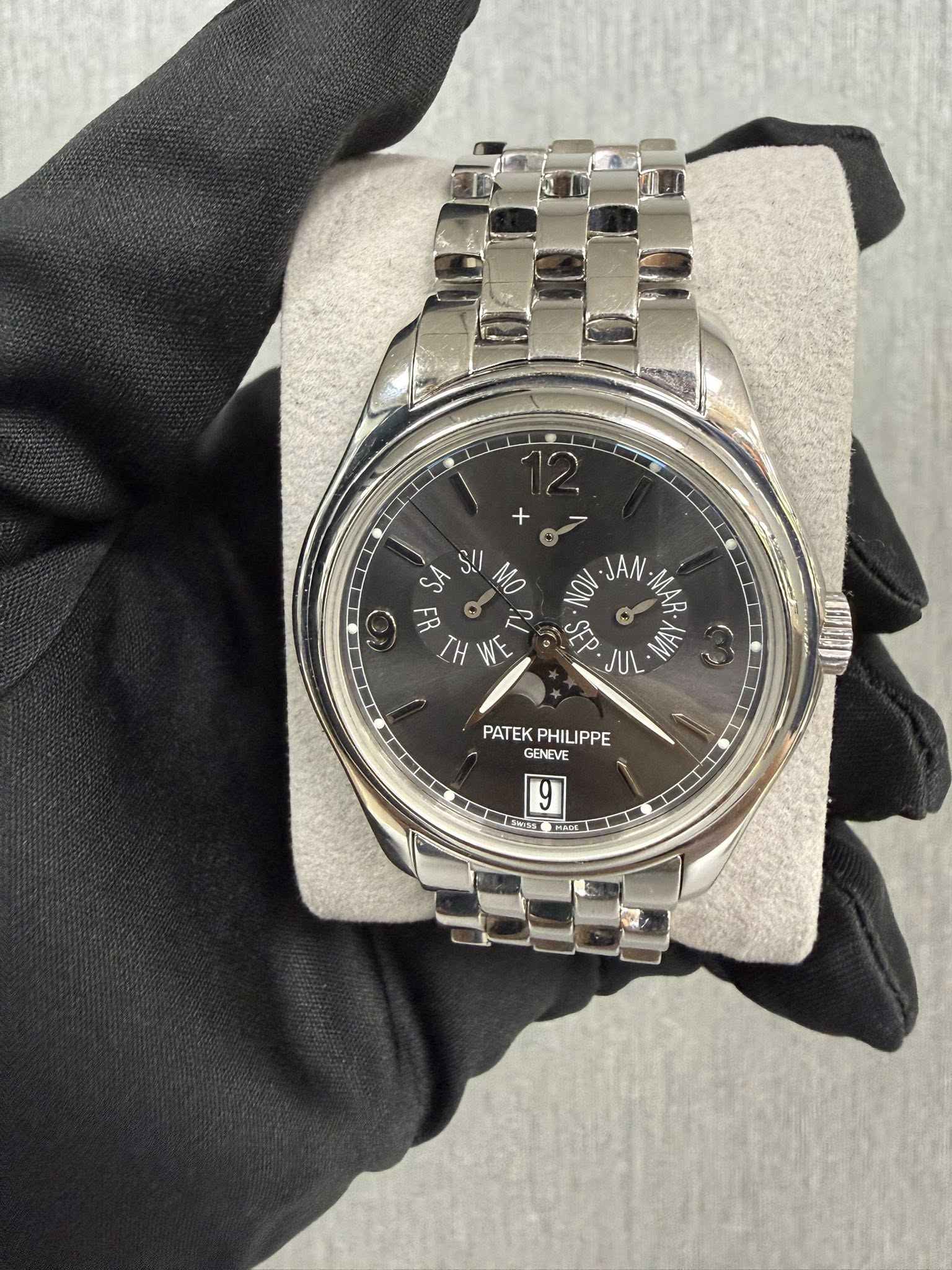 May be an image of wrist watch and text