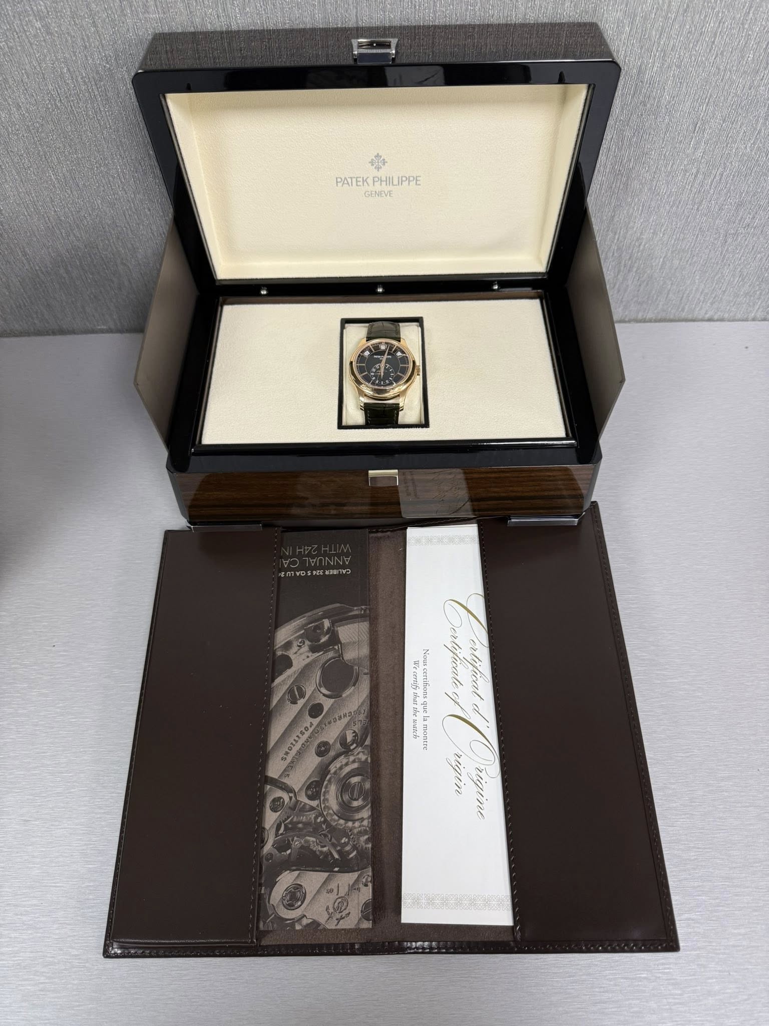 May be an image of wrist watch and text