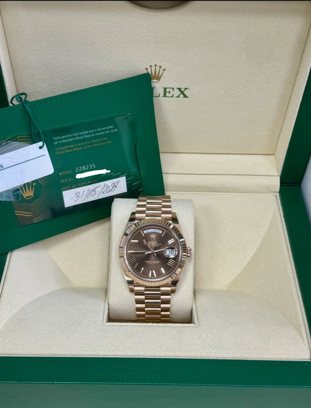 May be an image of wrist watch and text