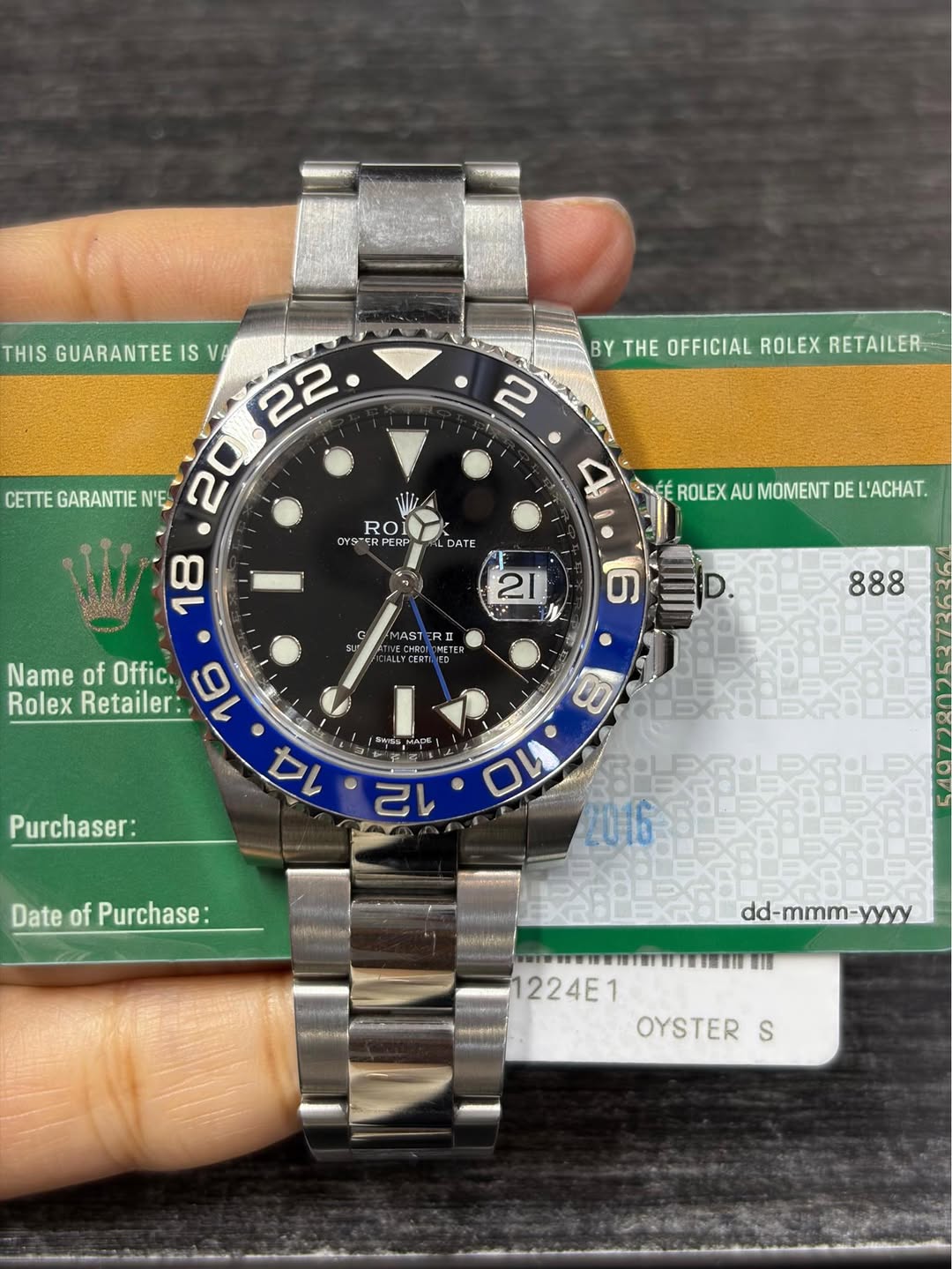 May be an image of wrist watch and text