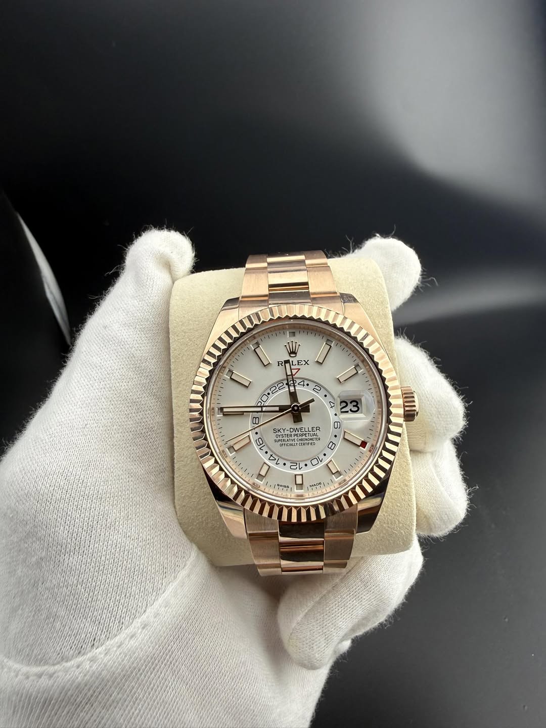 May be an image of wrist watch and text