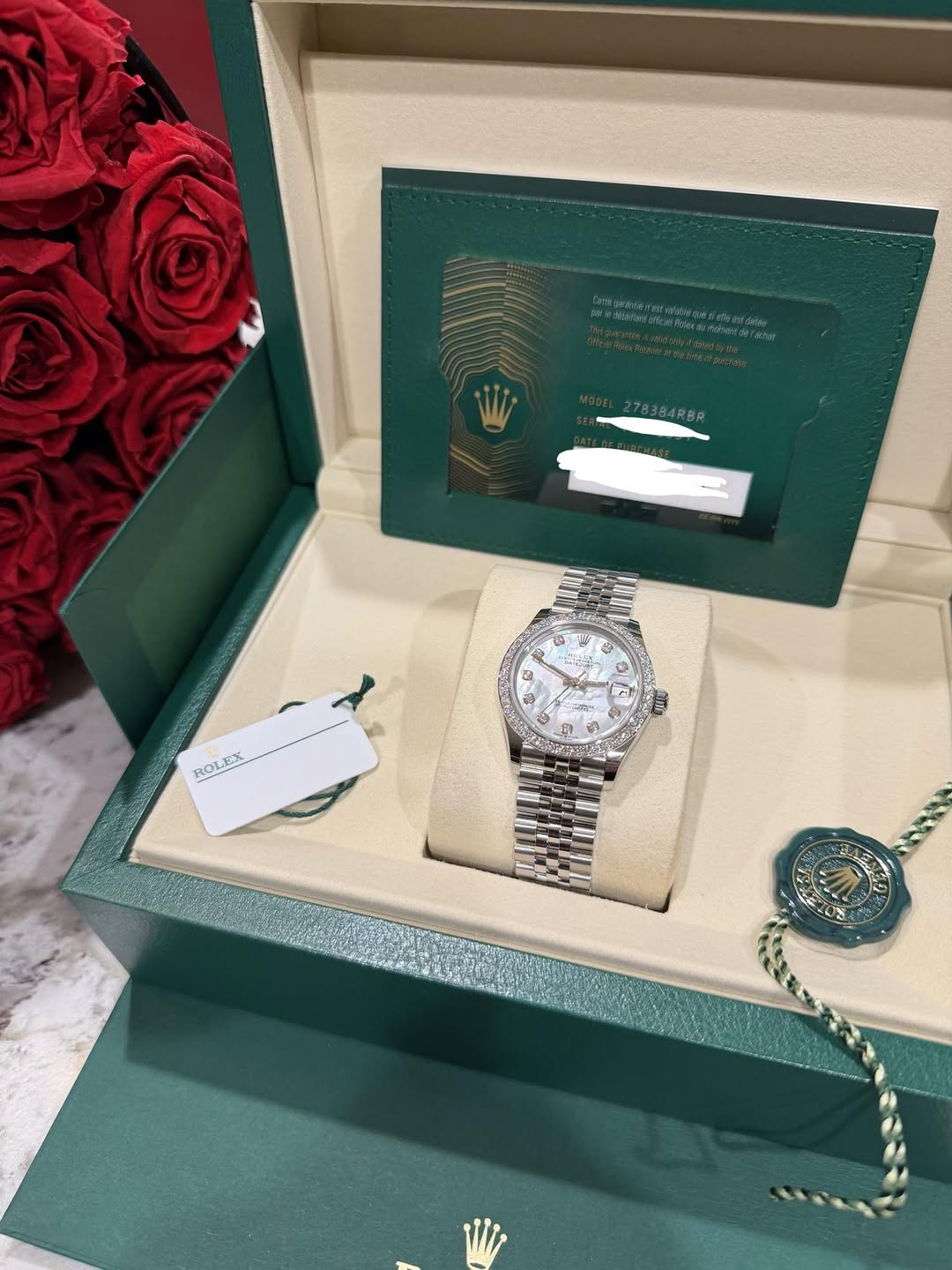 May be an image of wrist watch and text