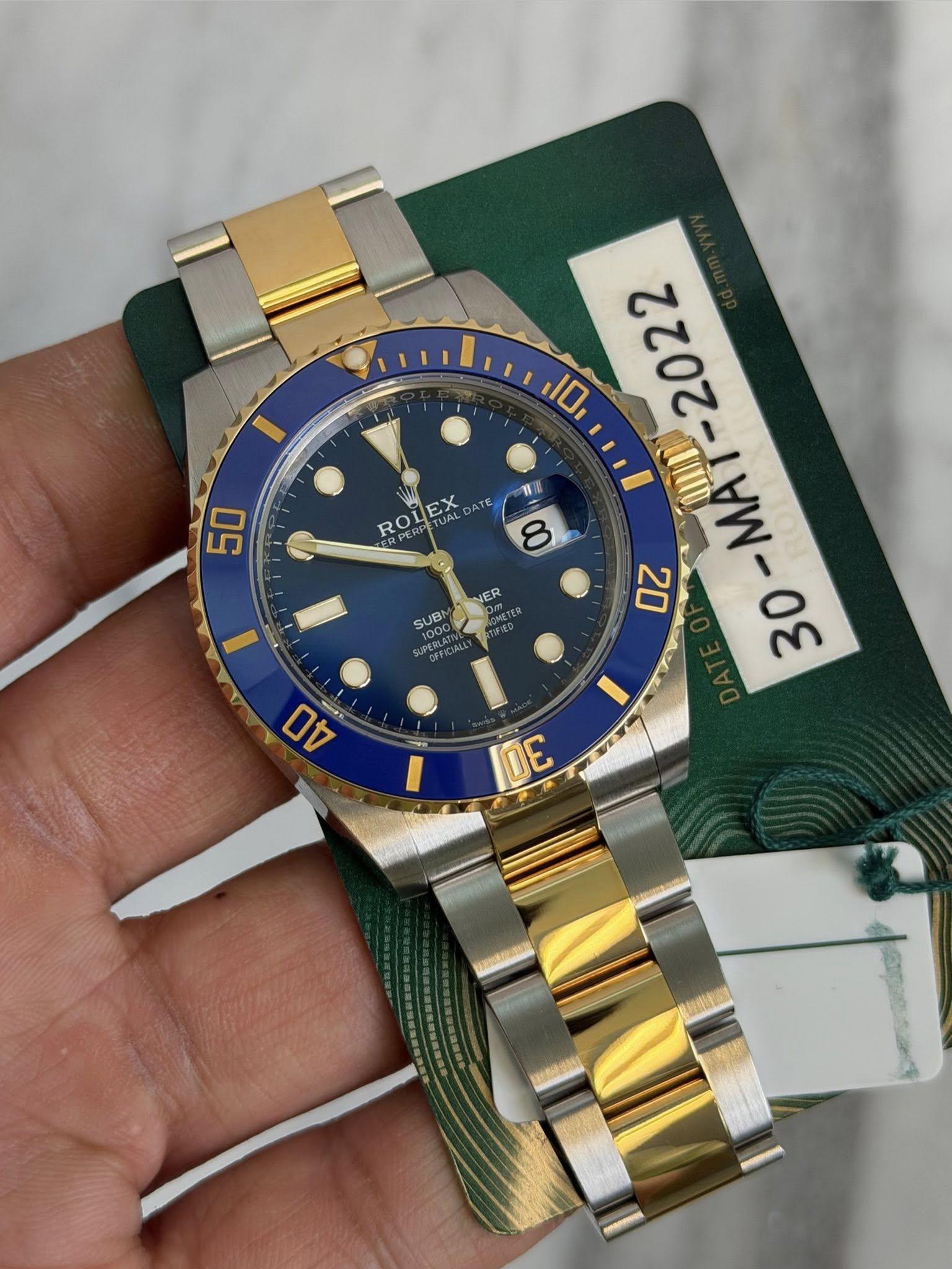 May be an image of wrist watch and text that says 'I 50 ROLEX UAL JAL DATE ROTUAL ROL LEX 10 2222-A2- ME ท 8 NER SOMETE PAETEC 20 33 SUB 1000 40 一 30'