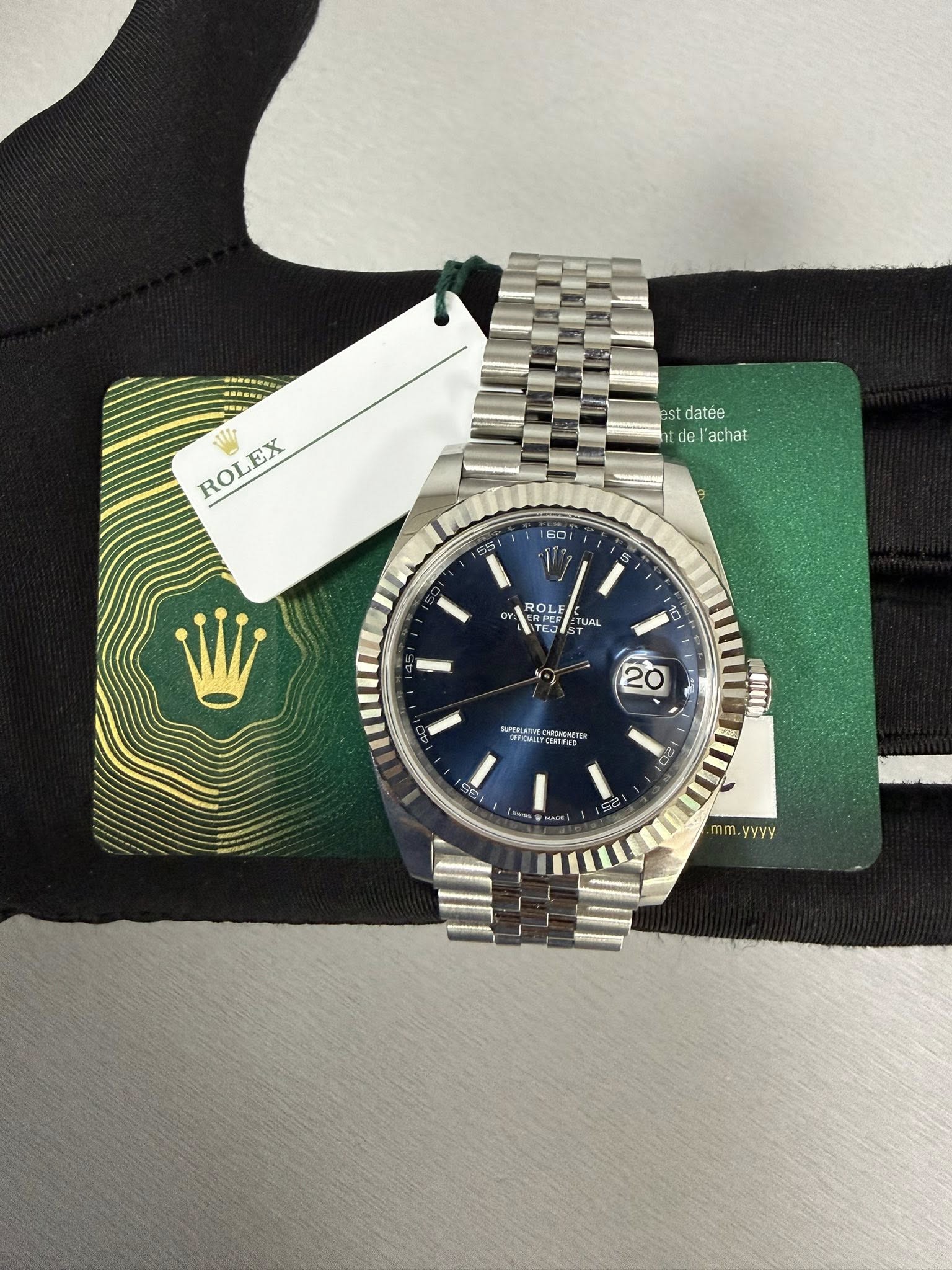 May be an image of wrist watch and text that says 'ROL ROLEX EX ast datée de 'achat 60 ROLE TUAL 20 SPEGLETIME SFTICIALL yBOOKTe RI SE se חכי ጠጣ yyyy'
