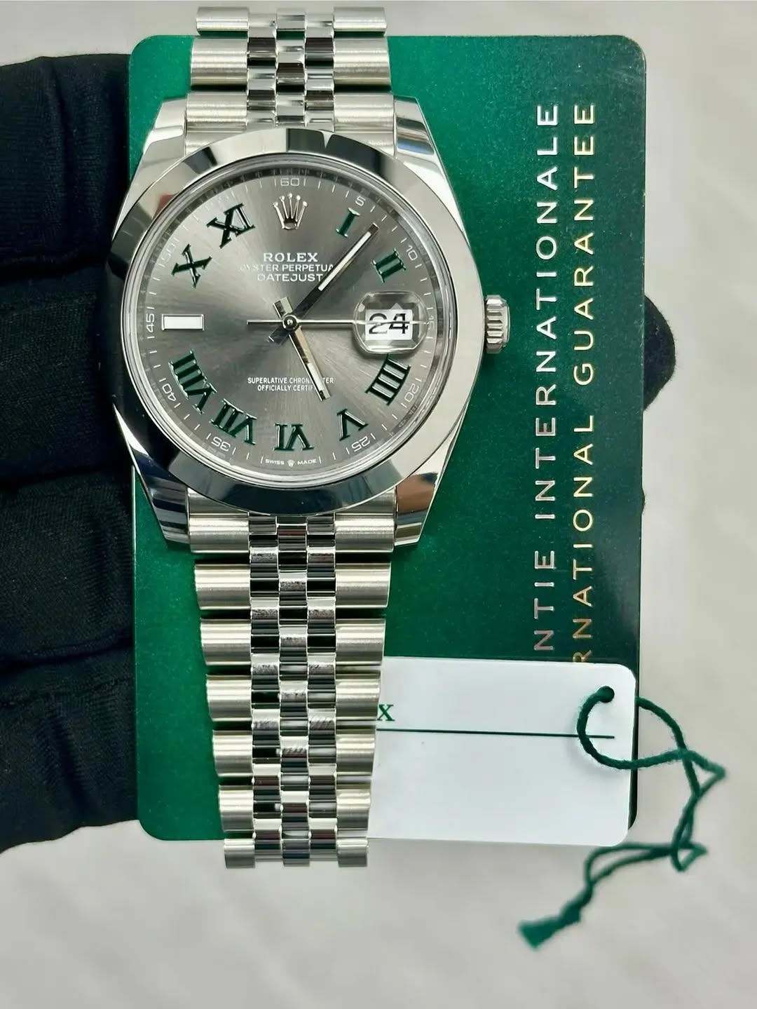 May be an image of wrist watch and text that says '160 5 ROLEX ERPETU TU JATEJUS 45 SUPEFLATINT oFFculsver 40 S0 y [Swea T HACE 25 كي 10 ငမ INTERNATIONALE NATIONALE…