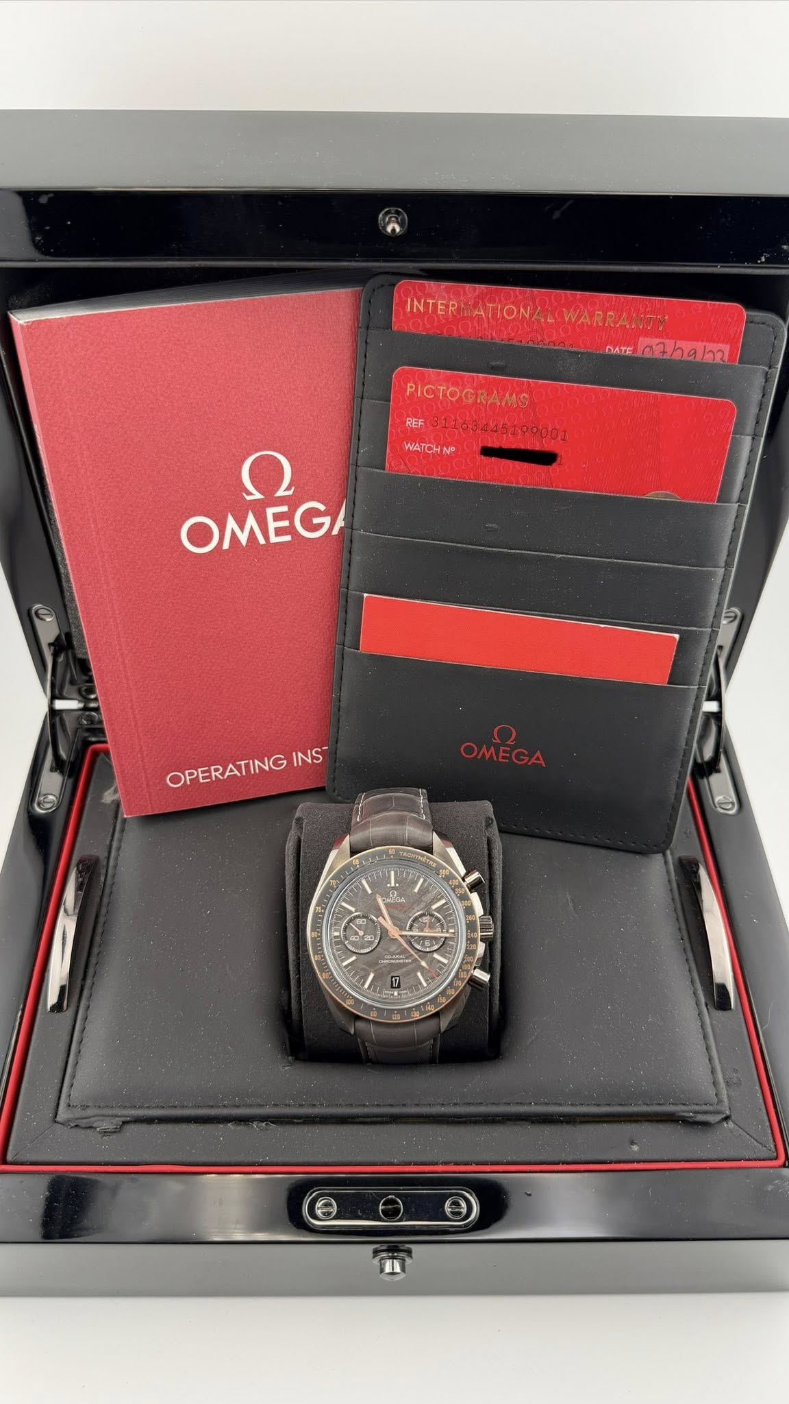 May be an image of wrist watch and text