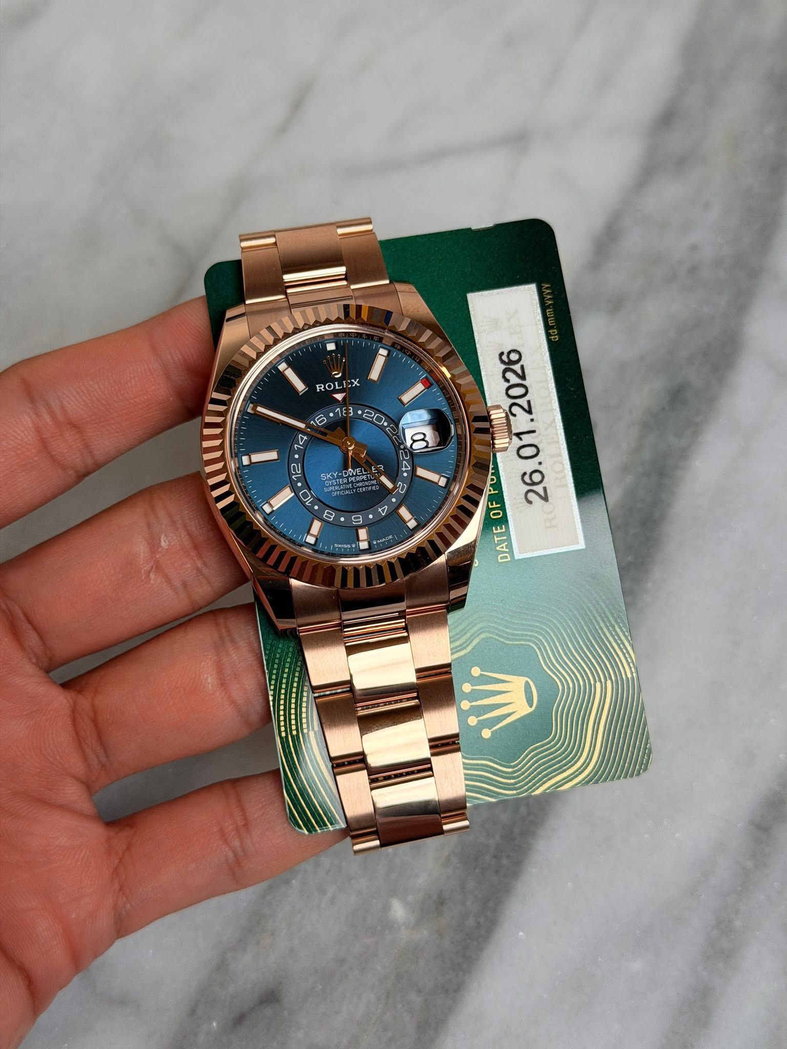 May be an image of wrist watch and text