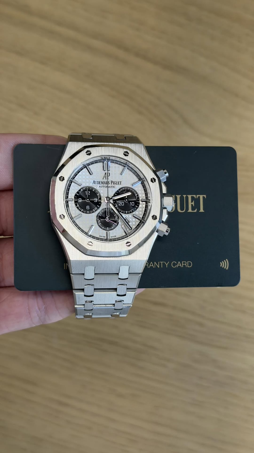 May be an image of wrist watch and text