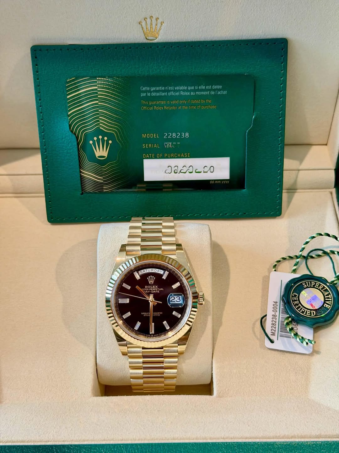 May be an image of wrist watch and text
