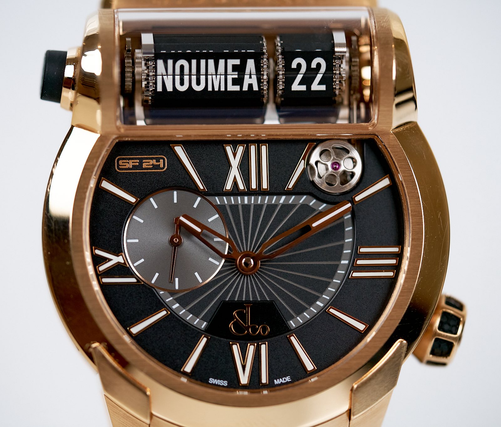 May be an image of wrist watch and text that says 'NOUMEA NO!!MC NUUMCA 22 SF SF24 SF24 24 ١ XII 8 Y SWISS _٧۱١ VI MADE Aa'
