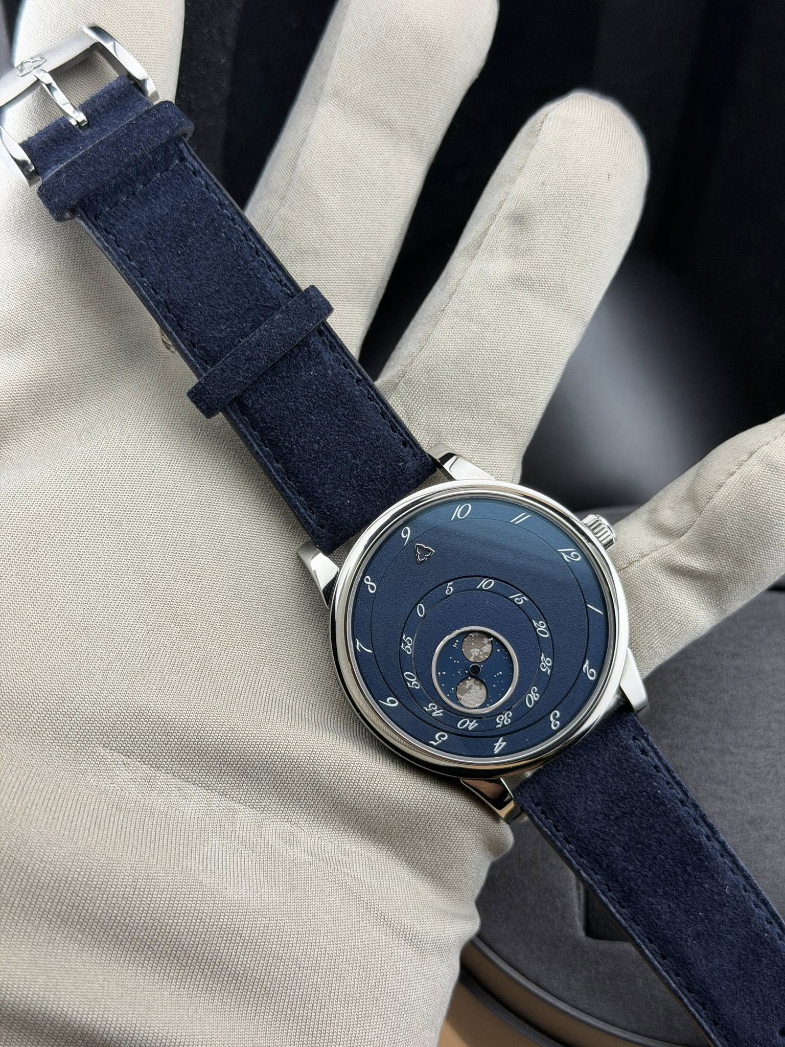 May be an image of wrist watch and text