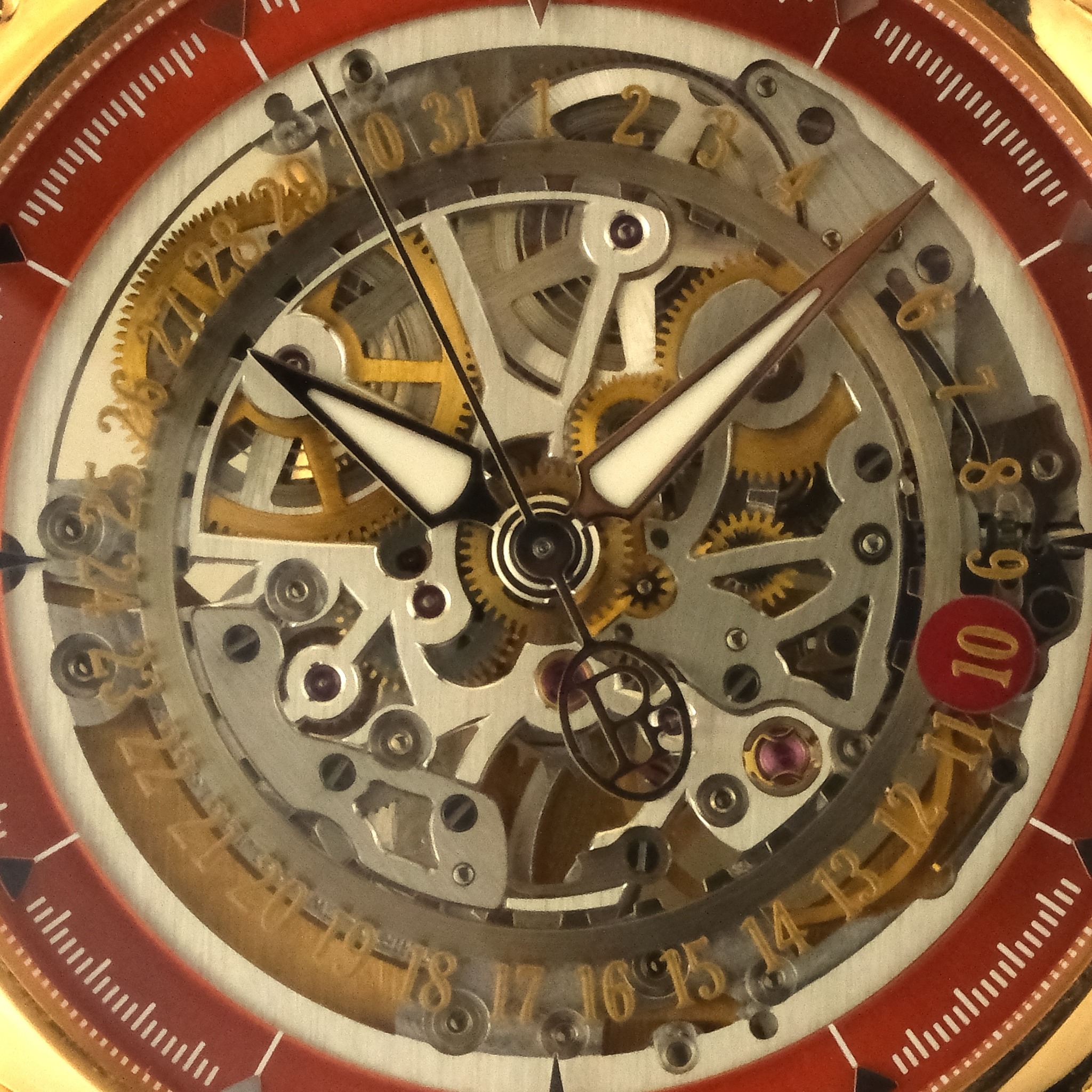 May be an image of wrist watch and text