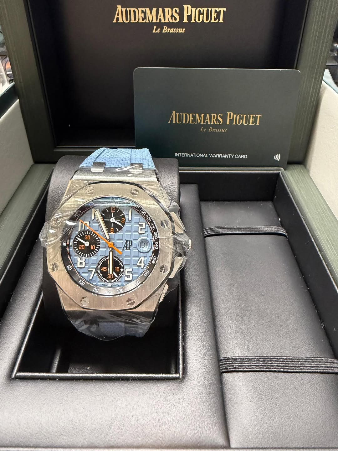 May be an image of wrist watch and text