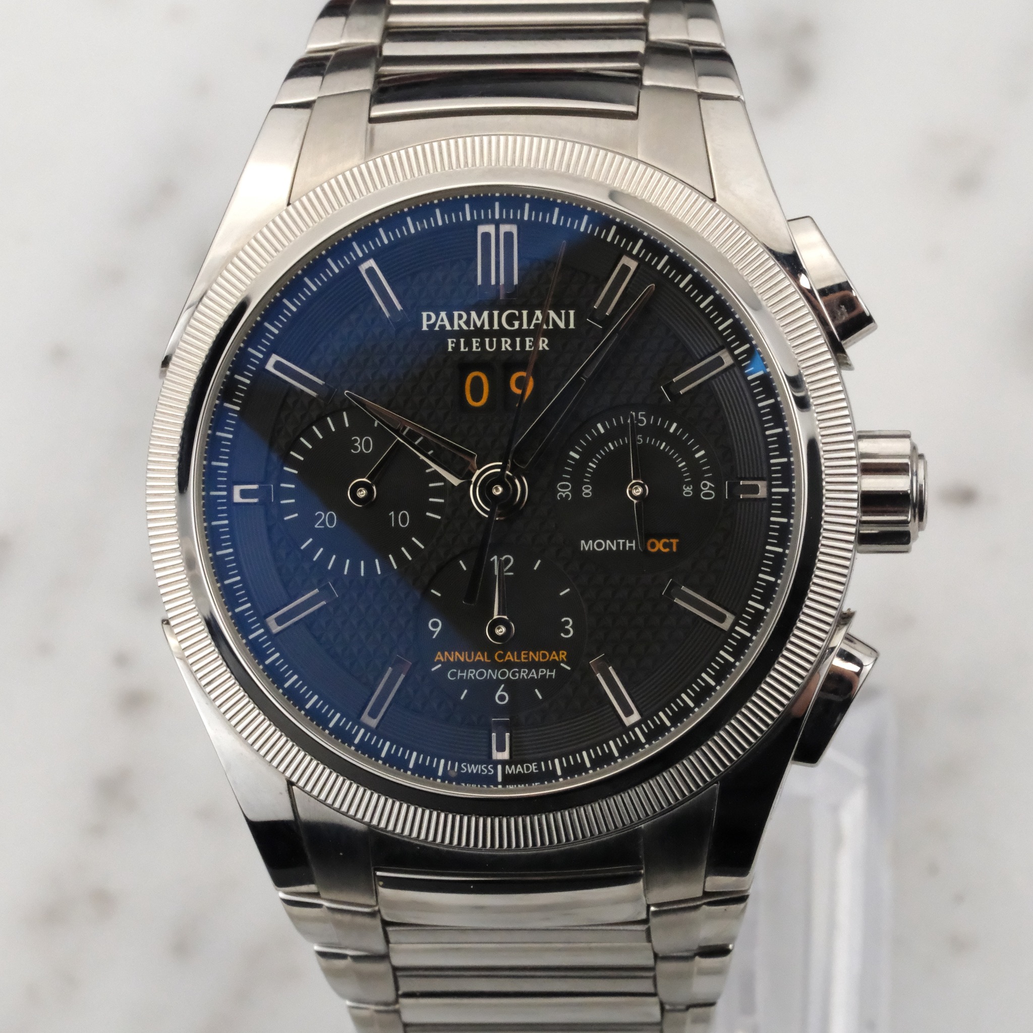 May be an image of wrist watch and text that says 'nn PARMIGIANI FLEURIER G 0 ludud: n hml Buh ul MONTH OCT 9 o) 3 CHRONOGRAPH CHRONG U USWISS MADE IE 1'