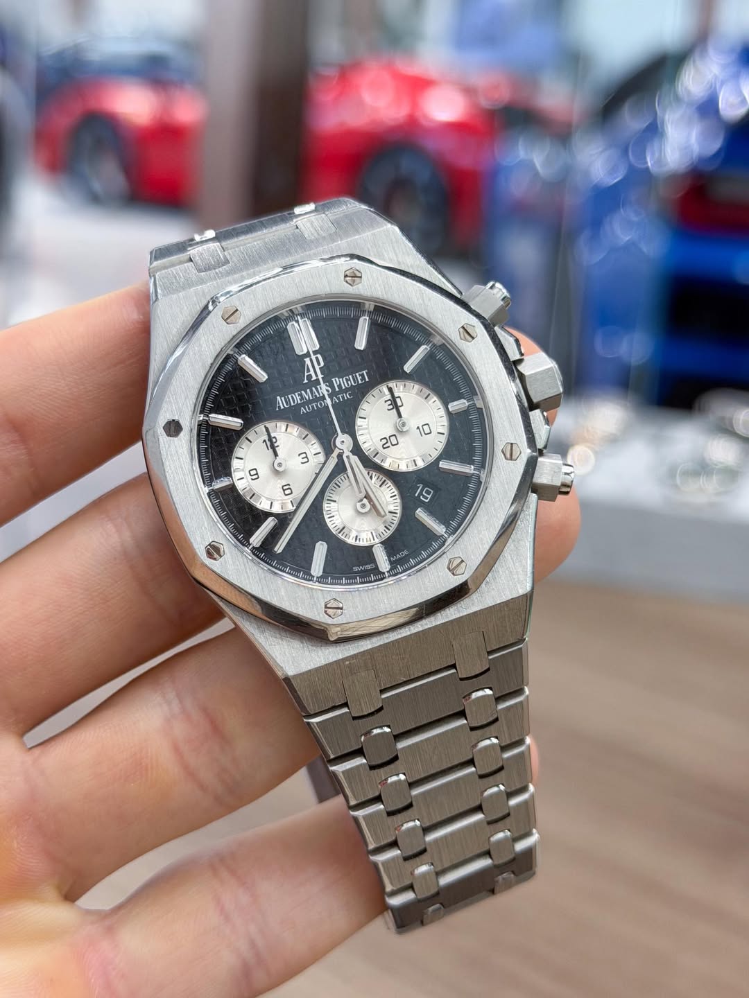 May be an image of wrist watch and text