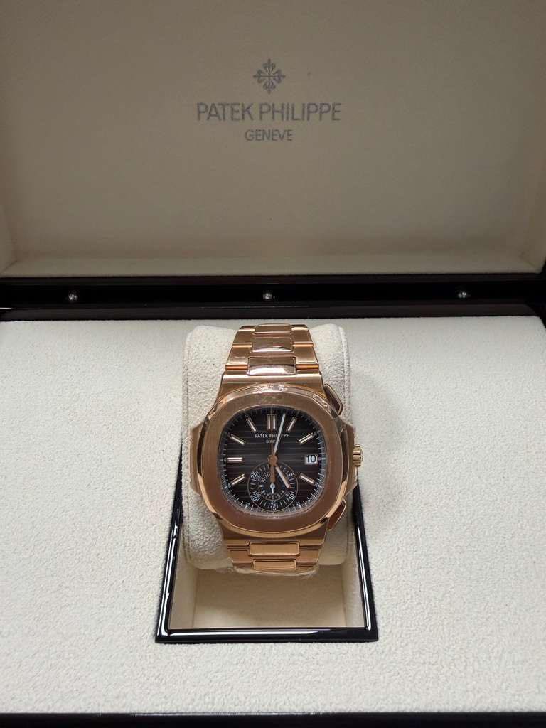May be an image of wrist watch and text that says 'PATEKPHILIPPE GENEVE C 10'