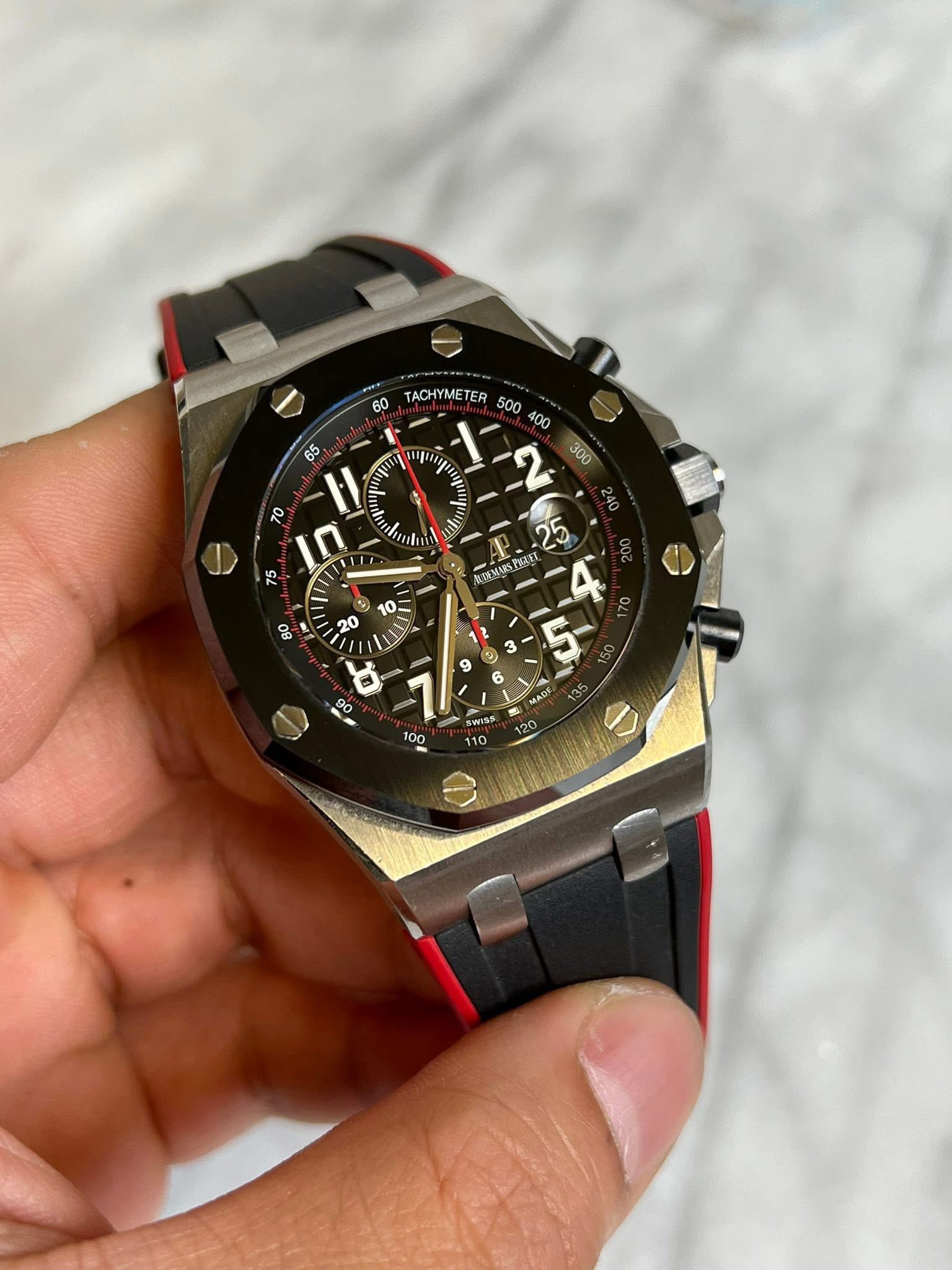 May be an image of wrist watch and text that says '60 60 TACHYMETER TER mju w T ย TO ம U D L - 1 9 p 3 3 5- MADS WISS 110'