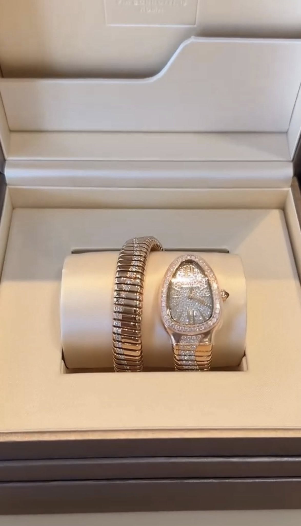 May be an image of jewelry, wrist watch and text