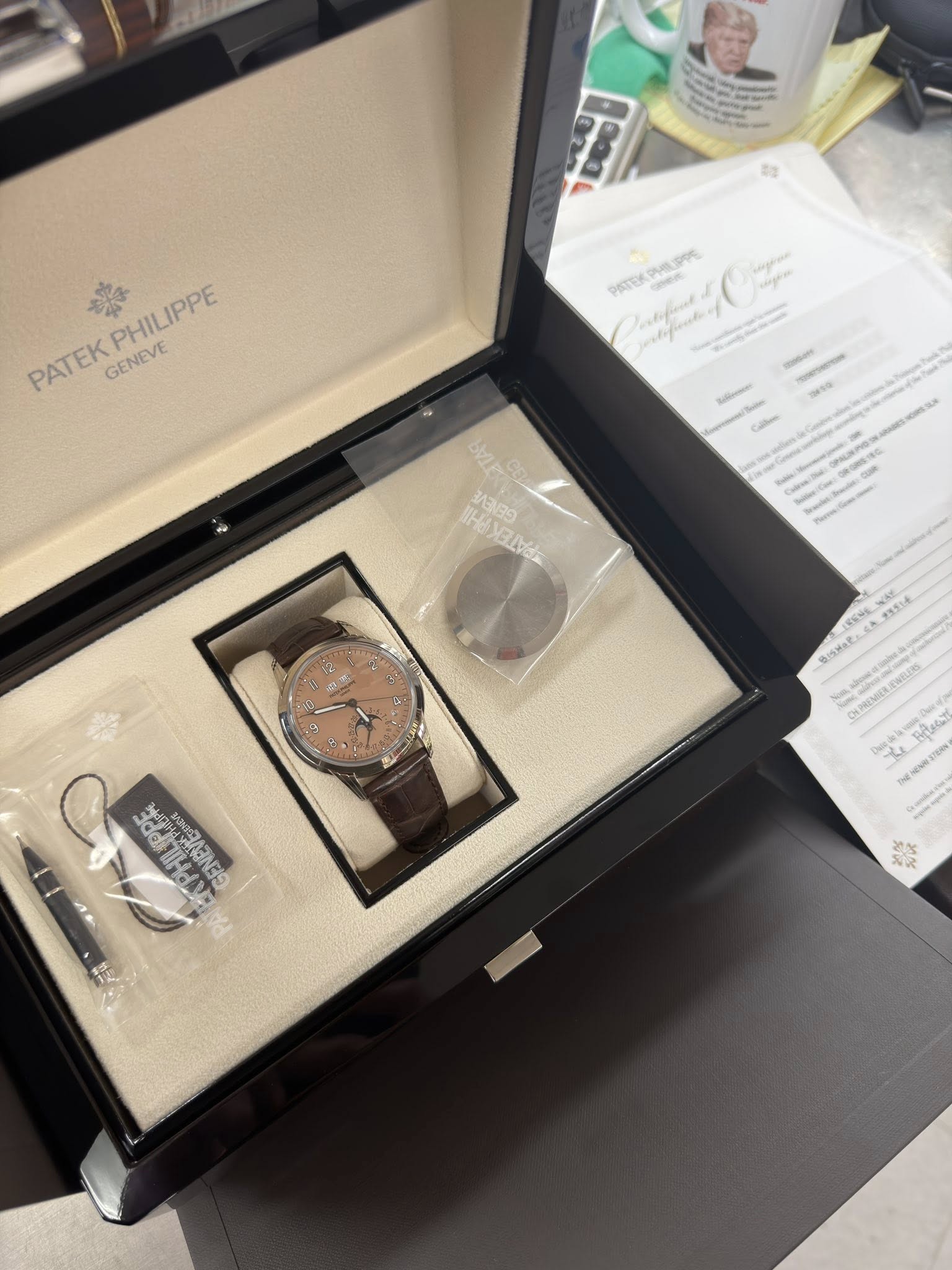 May be an image of wrist watch and text