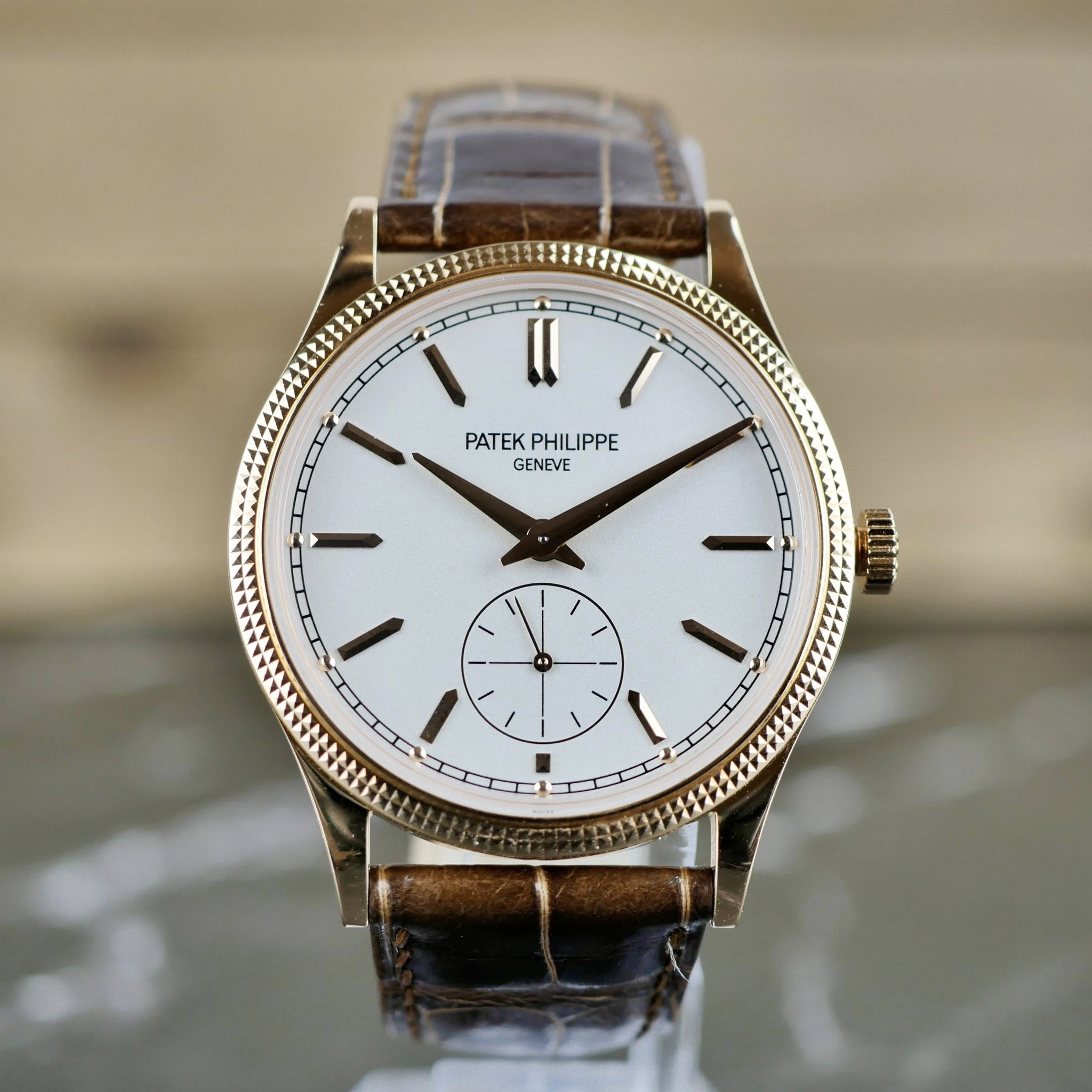 May be an image of wrist watch and text that says 'PATEKPHILIPPE PATEK PHILIPPE GENEVE ١ 6- ١'