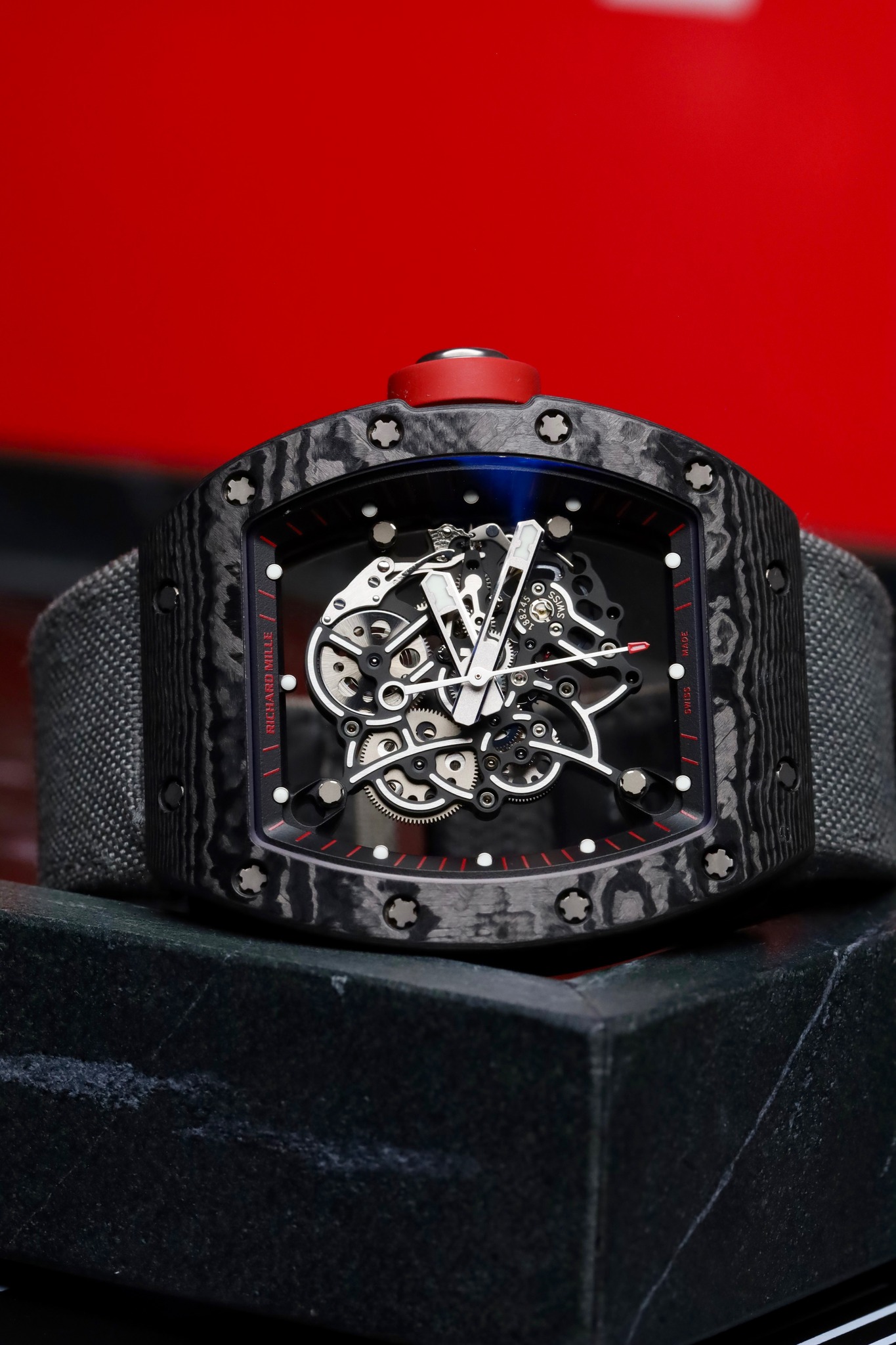 May be an image of wrist watch and text