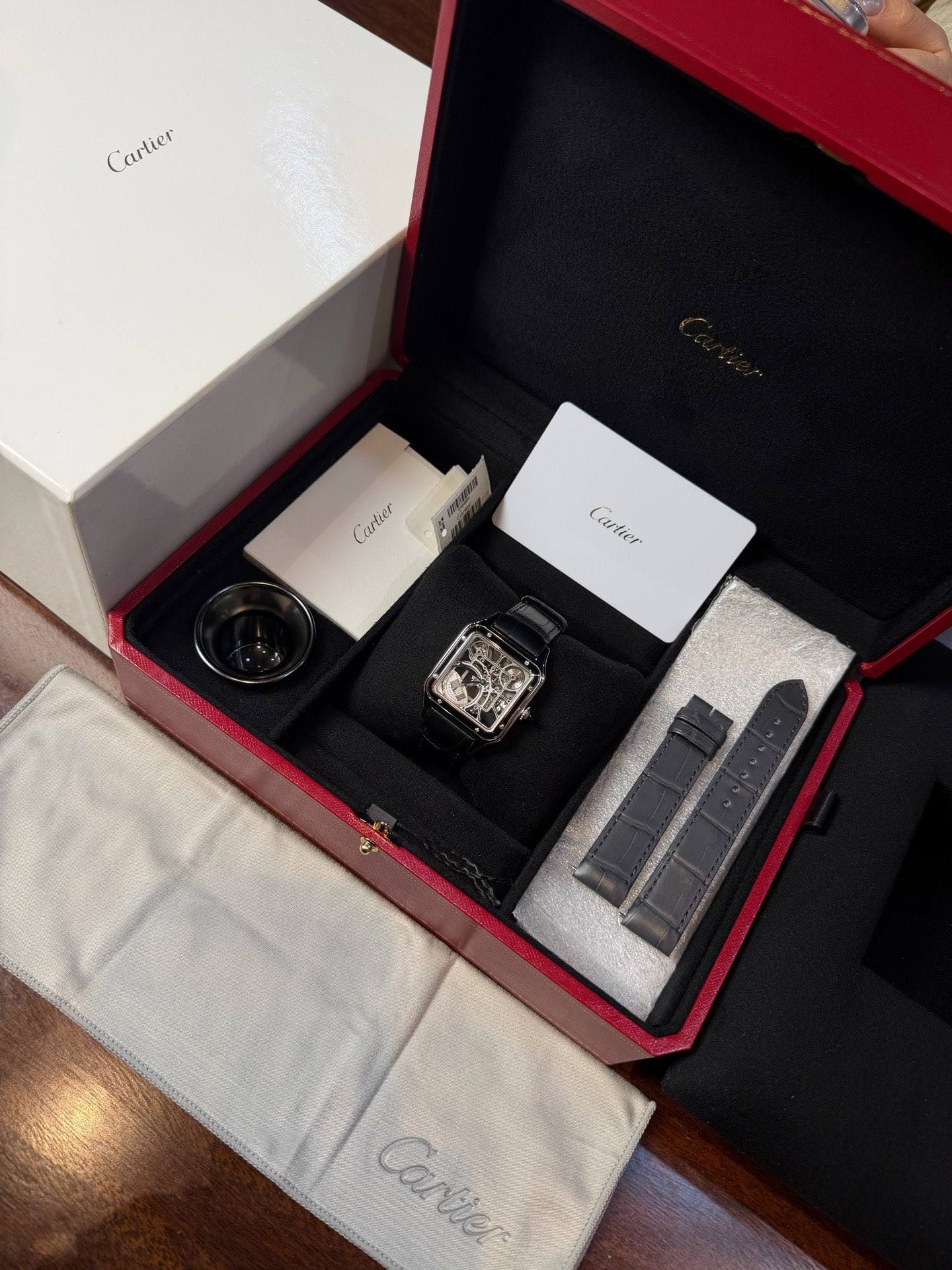 May be an image of digital watch and text that says 'Cartier artier Cartier Cartier'