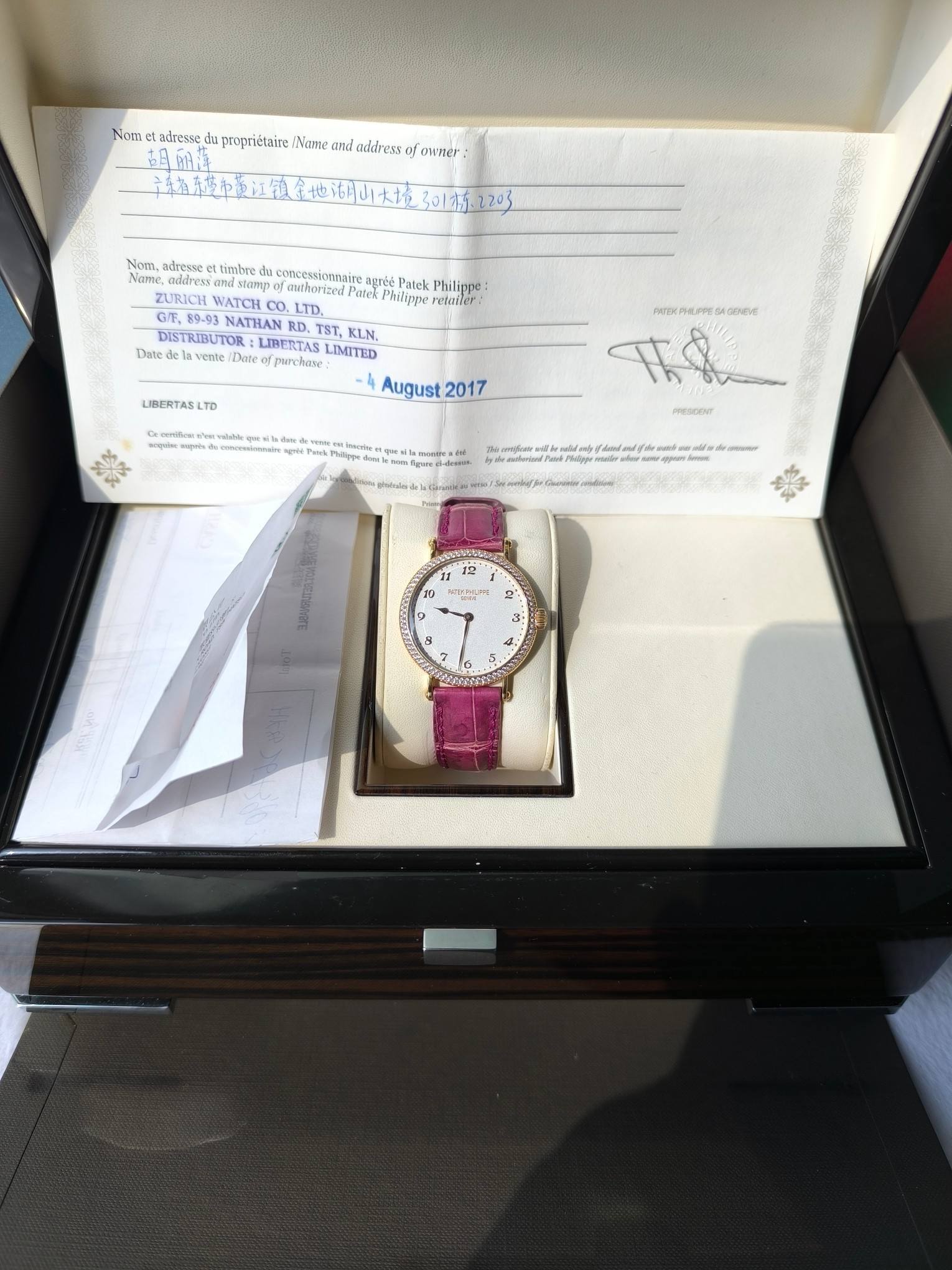 May be an image of wrist watch and text