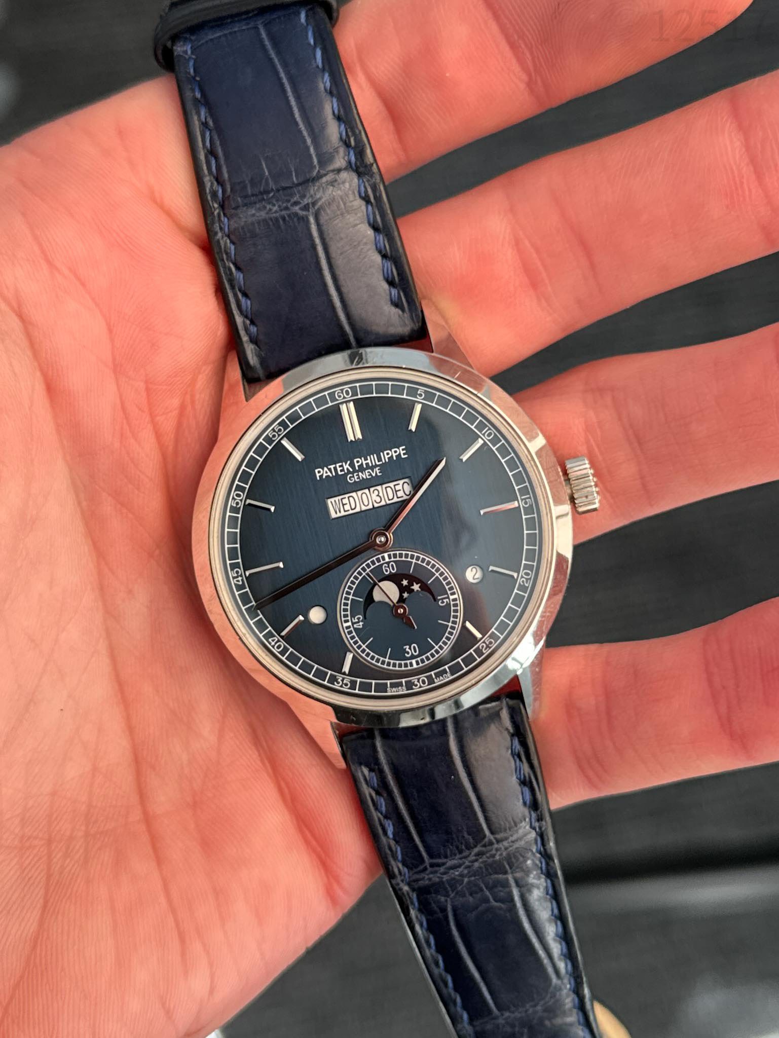 May be an image of wrist watch and text that says ' PATEK PHIL IPPE PHILIPPE WED03DE0 GENEVE GENEVE 0 15 前前 60 02 1ল S 45 V 5 15 X 8 E 는 北 OF '