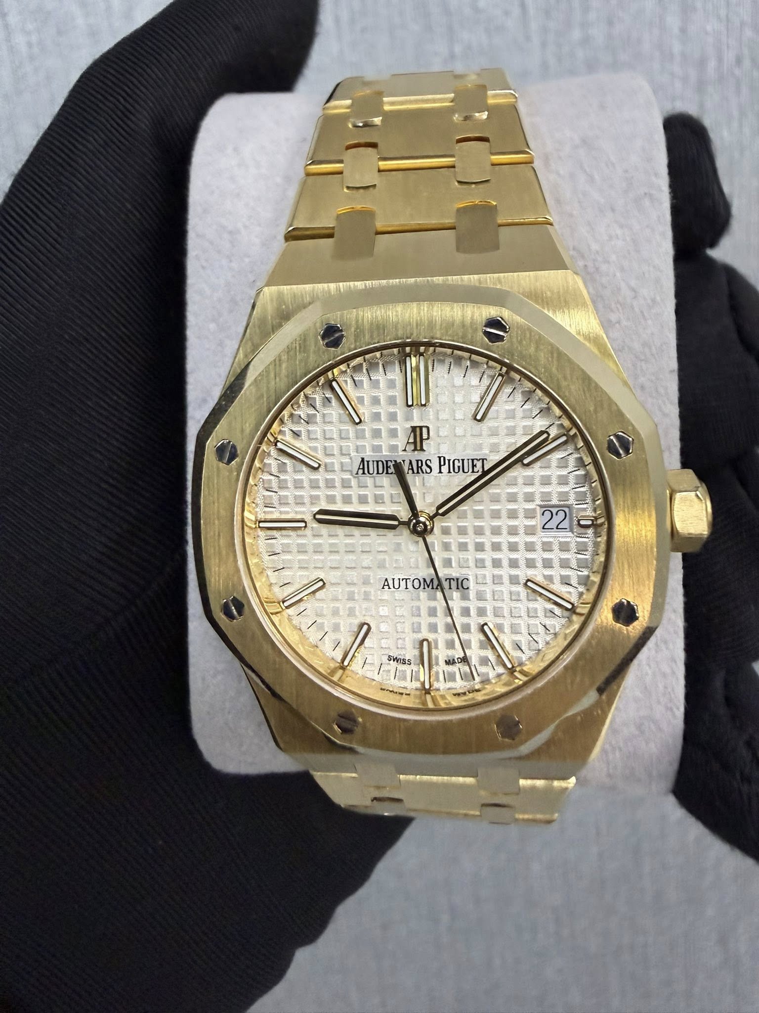 May be an image of wrist watch and text