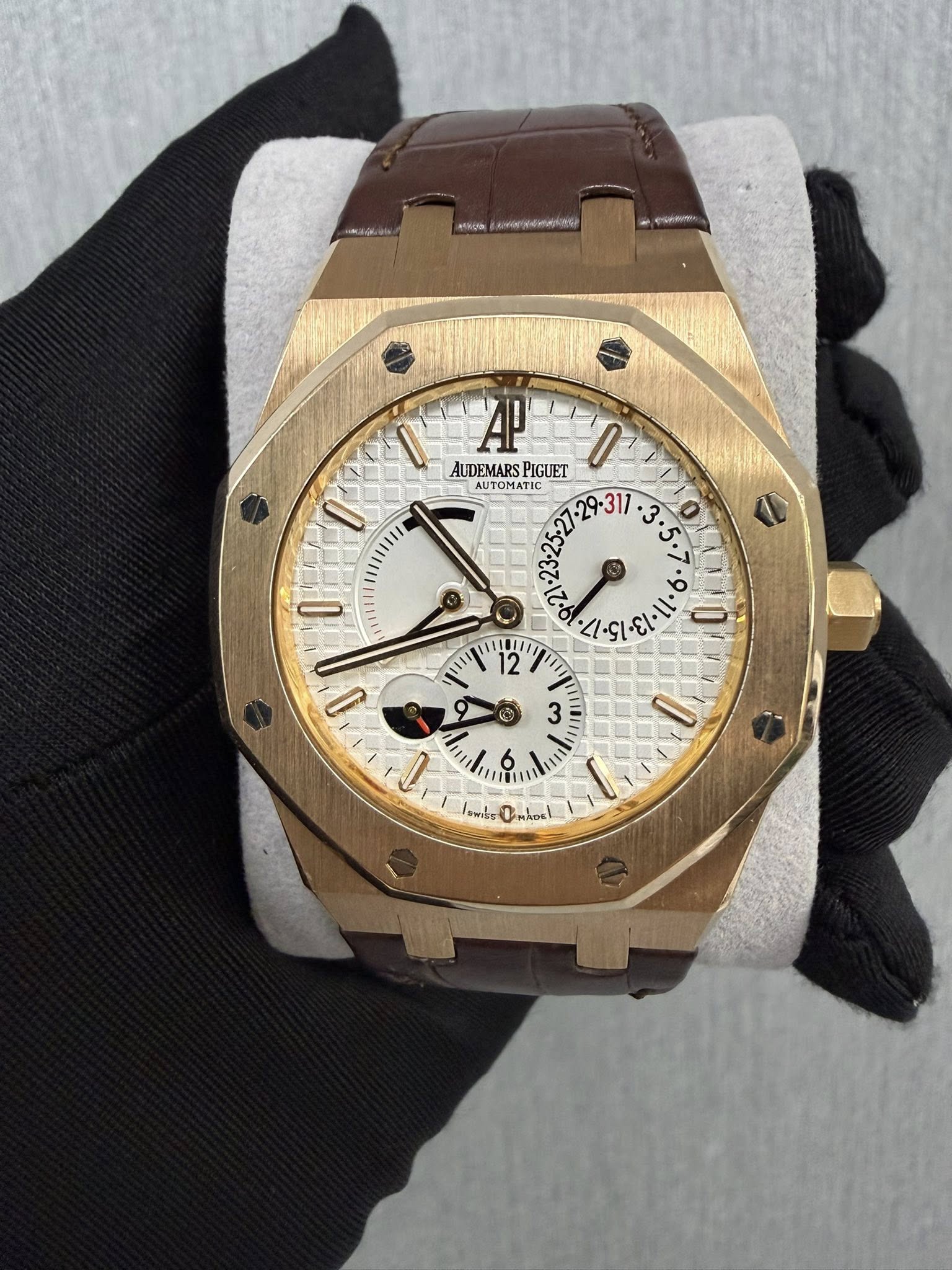 May be an image of wrist watch and text