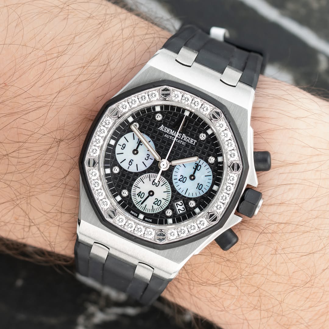 May be an image of wrist watch and text
