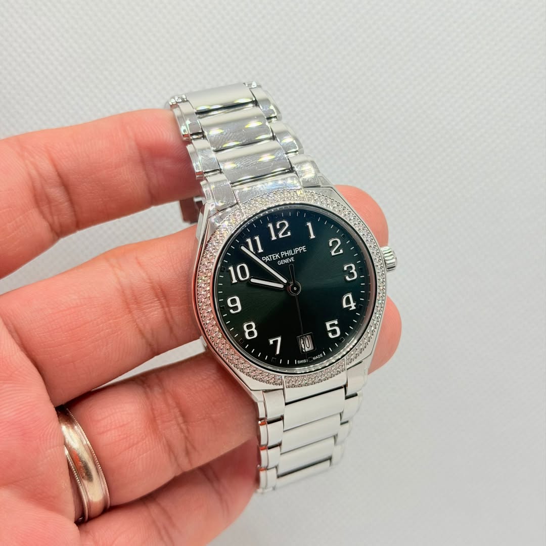 May be an image of wrist watch and text
