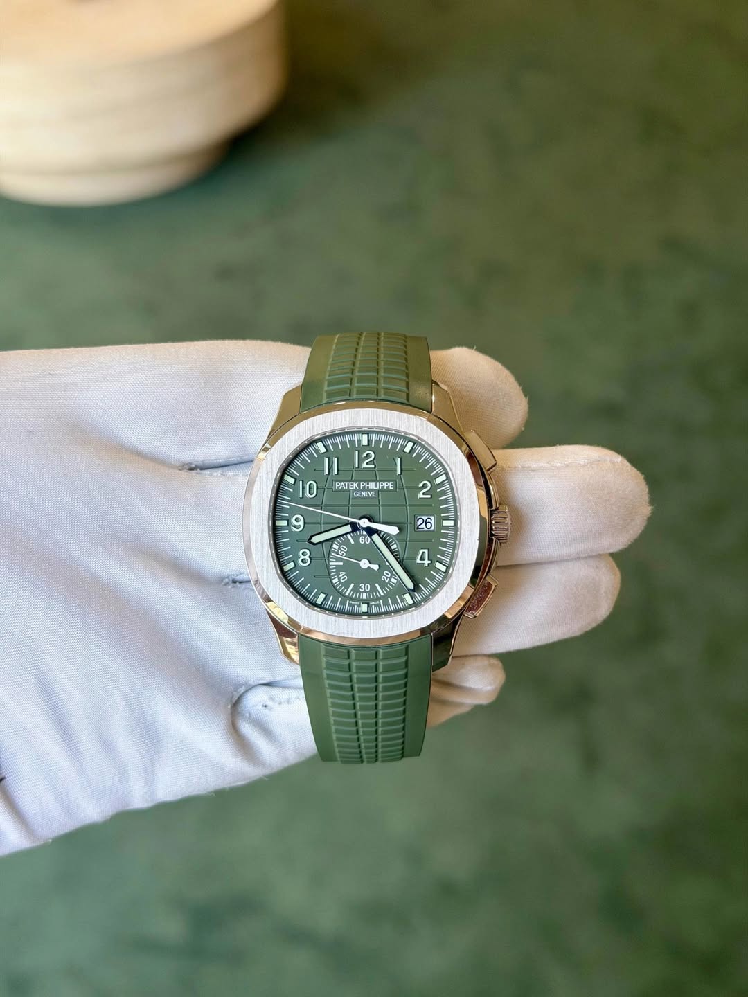 May be an image of wrist watch and text