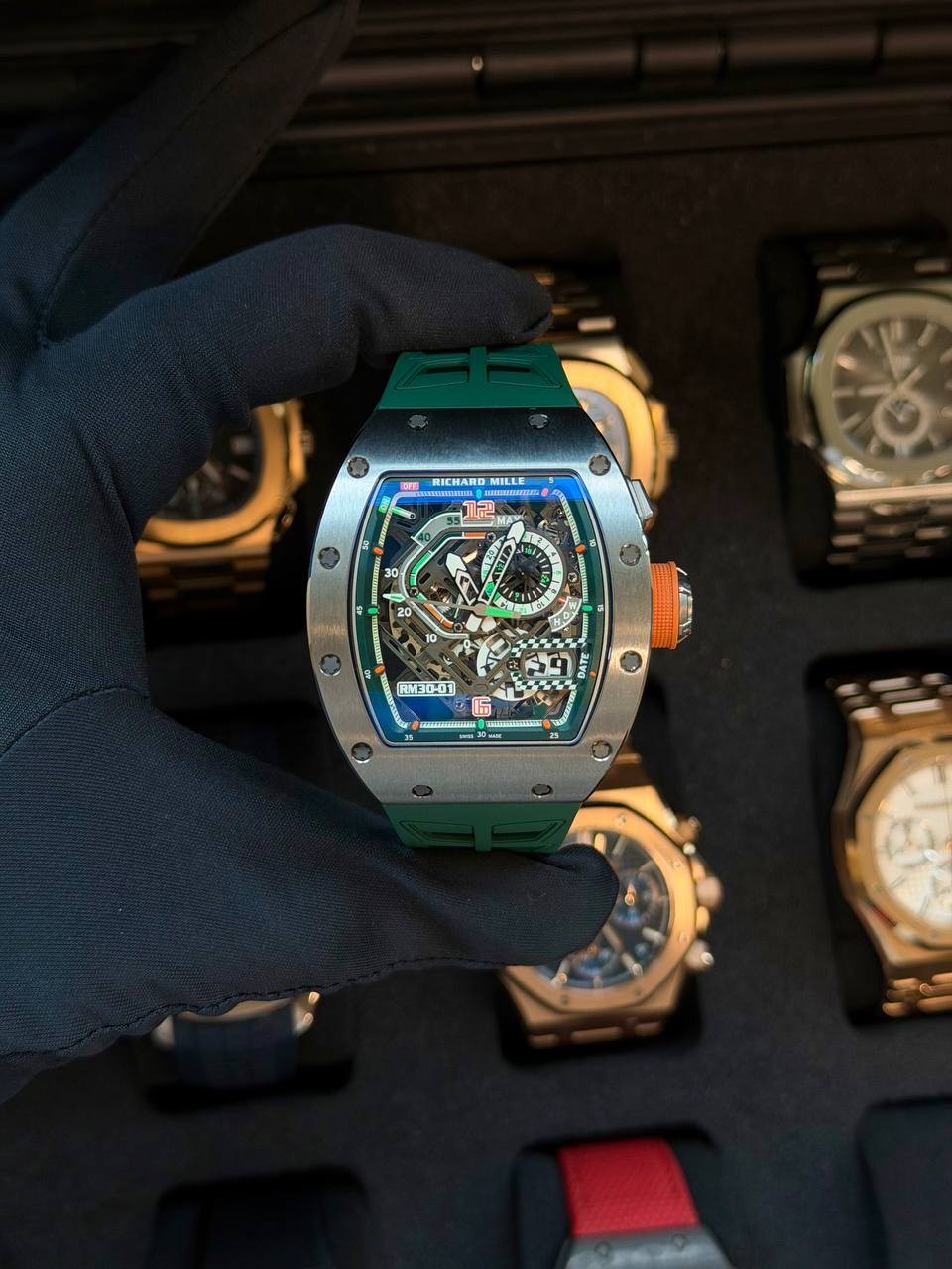 May be an image of wrist watch and text