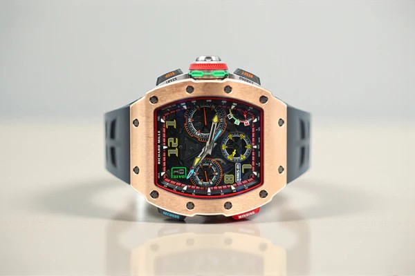 May be an image of wrist watch and text
