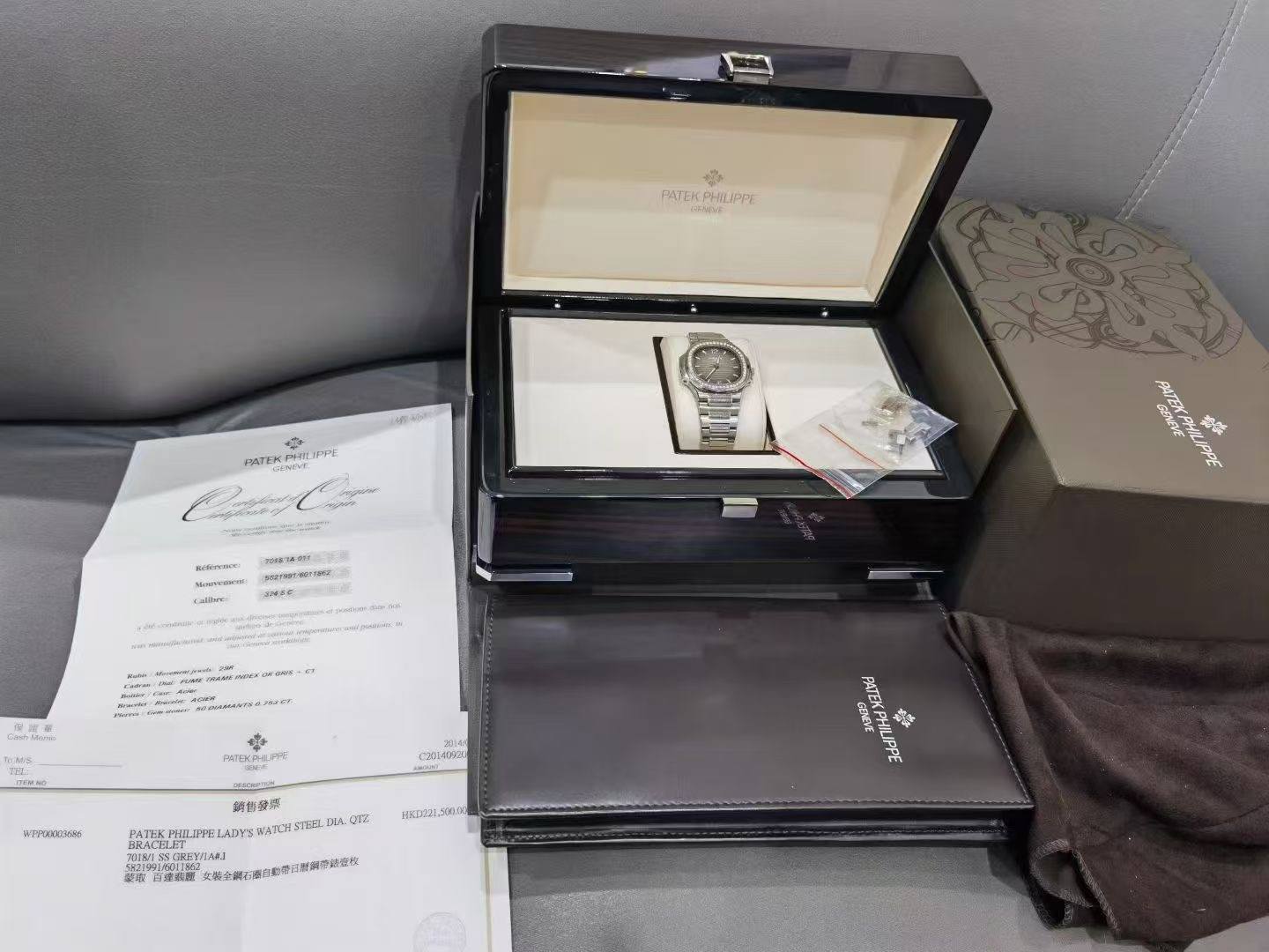 May be an image of wrist watch and text