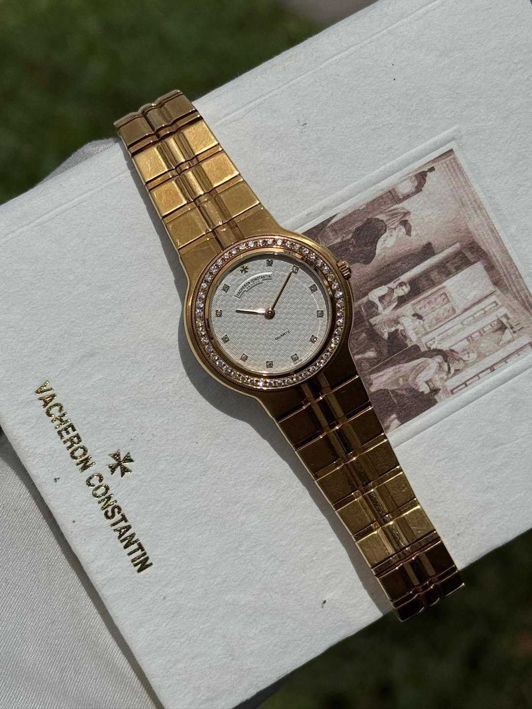 May be an image of wrist watch and text