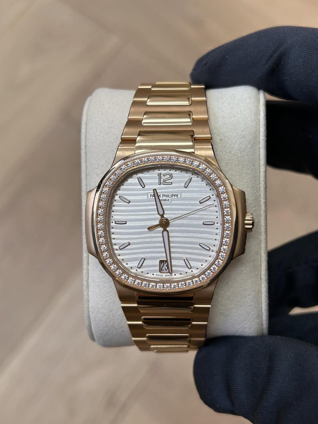 May be an image of wrist watch and text