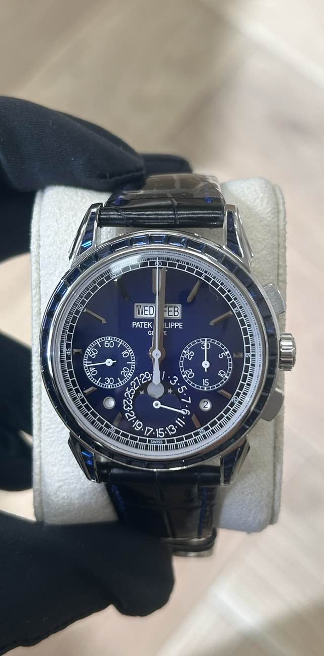 May be an image of wrist watch and text that says 'WED PATEK GE EB LIPPE ن بع ی 15 B 15 5 5 1 ۵ O የኛ بی ای ک a ۷ ၈ ٢'