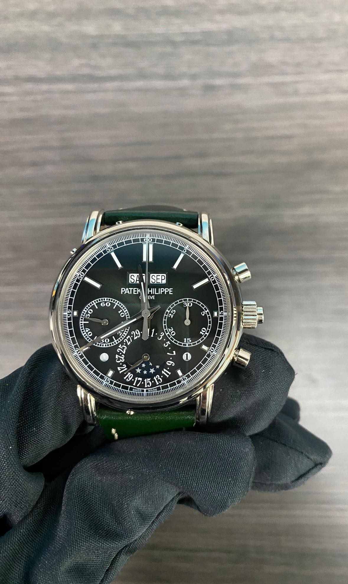 May be an image of wrist watch and text