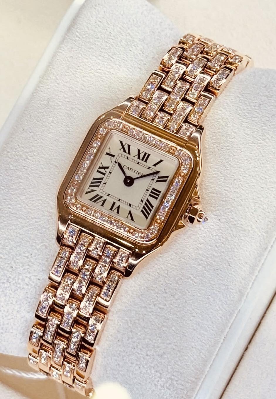 May be an image of wrist watch, jewelry and text