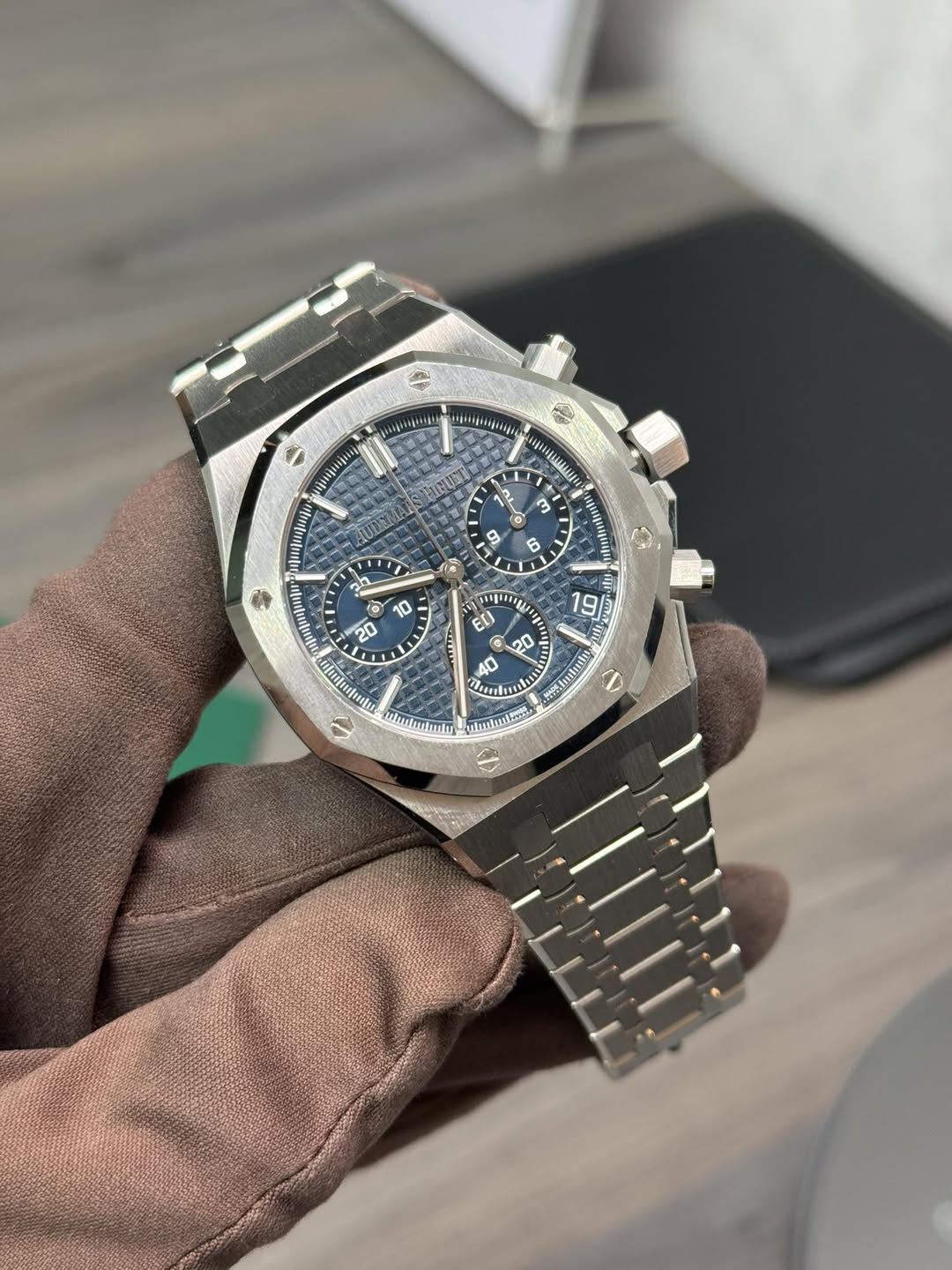May be an image of wrist watch and text