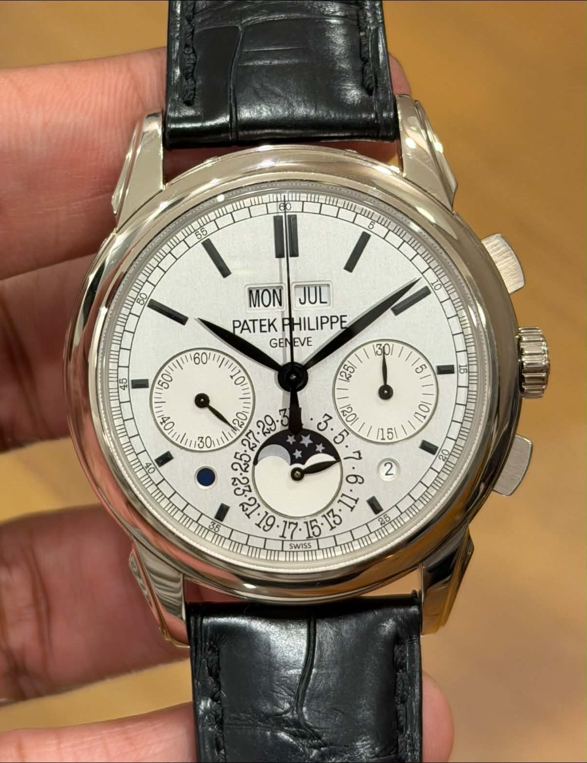 May be an image of wrist watch and text