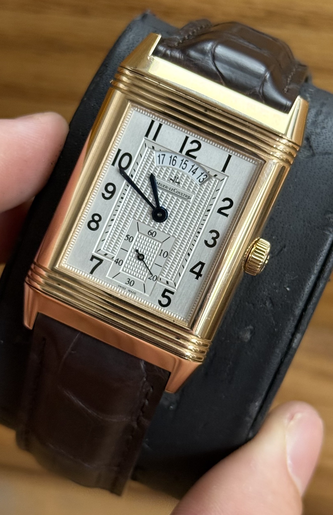 May be an image of digital watch and text