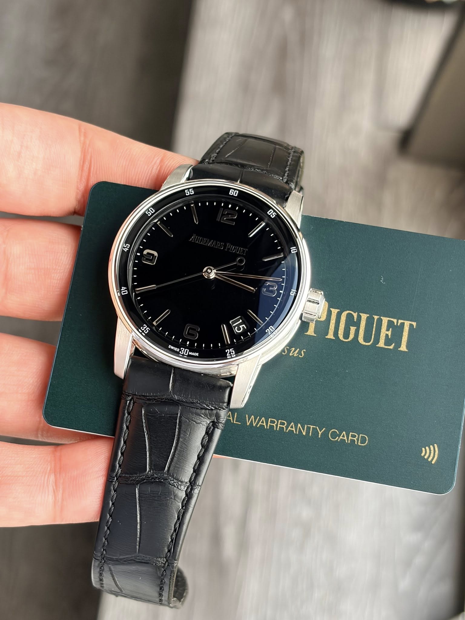 May be an image of wrist watch and text that says ' rwsS3 wx30mA 30HABk 25 อ us PIGUET AL WARRANTY CARD'